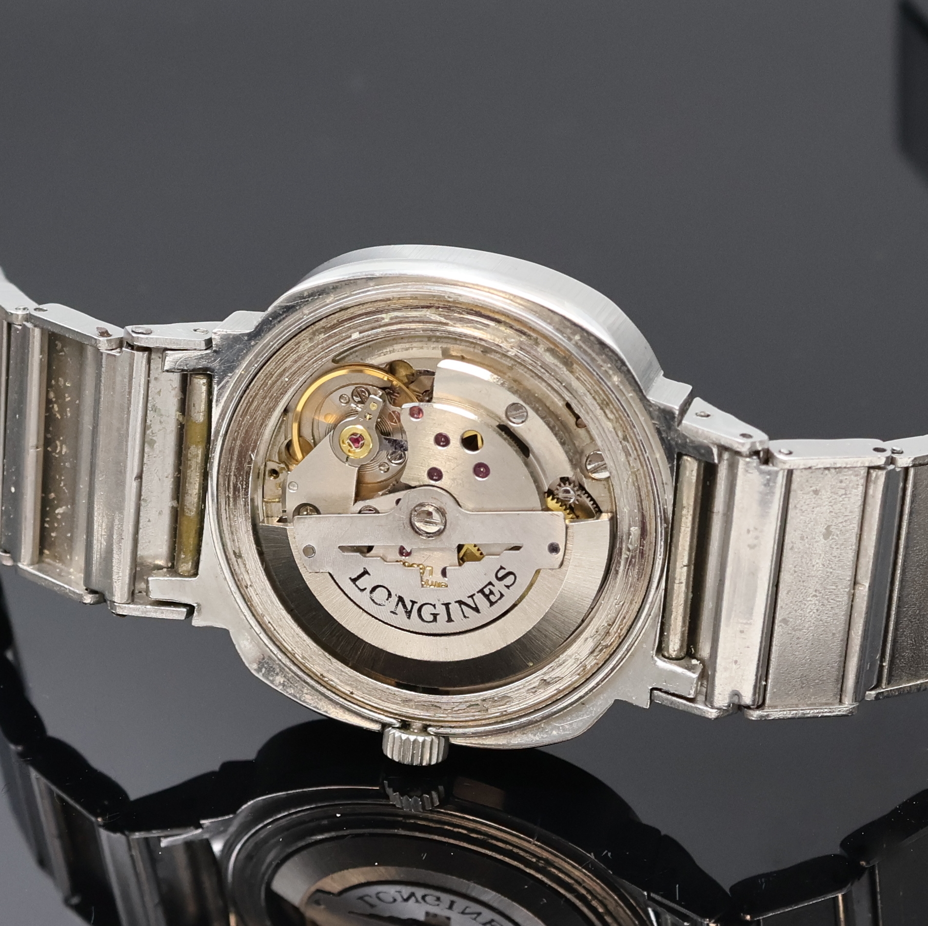 Detail f: LONGINES Herrenarmbanduhr in Stahl/Stahlband, Schweiz um 1972, Automatik, verschr. TV- Screen-Geh., orig. Krone, silb. Zifferbl. fl., silb. Indizes ...