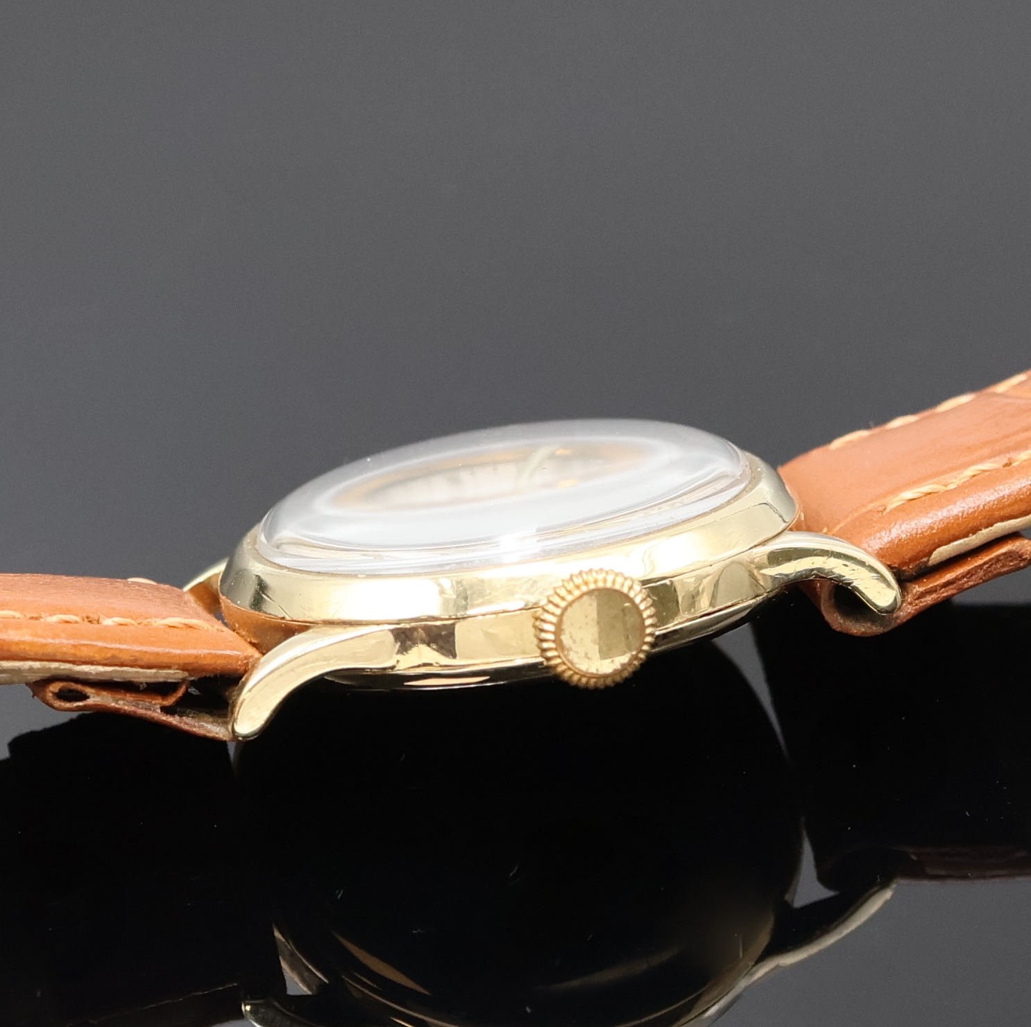 Detail b: MOVADO Chronometre Armbanduhr in GG 585/000, Schweiz um 1935, Handaufzug, 3-tlg. Geh., Boden m. Widmungsgrav. u. Glasrand aufgedr., silb. Zifferbl. ...
