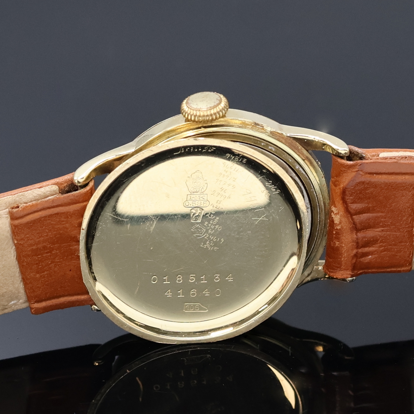 Detail e: MOVADO Chronometre Armbanduhr in GG 585/000, Schweiz um 1935, Handaufzug, 3-tlg. Geh., Boden m. Widmungsgrav. u. Glasrand aufgedr., silb. Zifferbl. ...