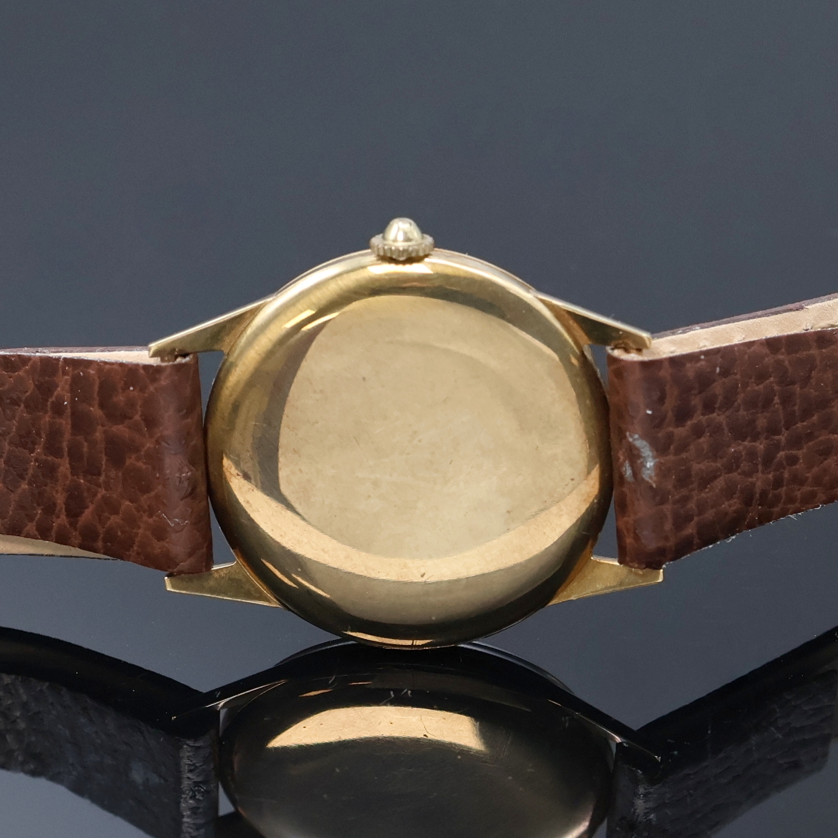 Detail b: MOVADO Armbanduhr in GG 375/000, Schweiz um 1935, Handaufzug, 3-tlg. Geh., Boden u. Glasrand aufgedr., silb. Zifferbl. m. Breguetzahlen rest., gold. ...