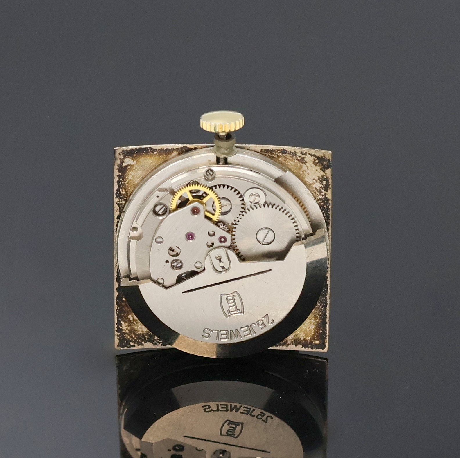 Detail d: PREZIOSA quadratische Herrenarmbanduhr in GG 585/000, Deutschland um 1955, Automatik, 2- tlg. Geh., Boden aufgedr., silb. Zifferbl. pat., gold. ...