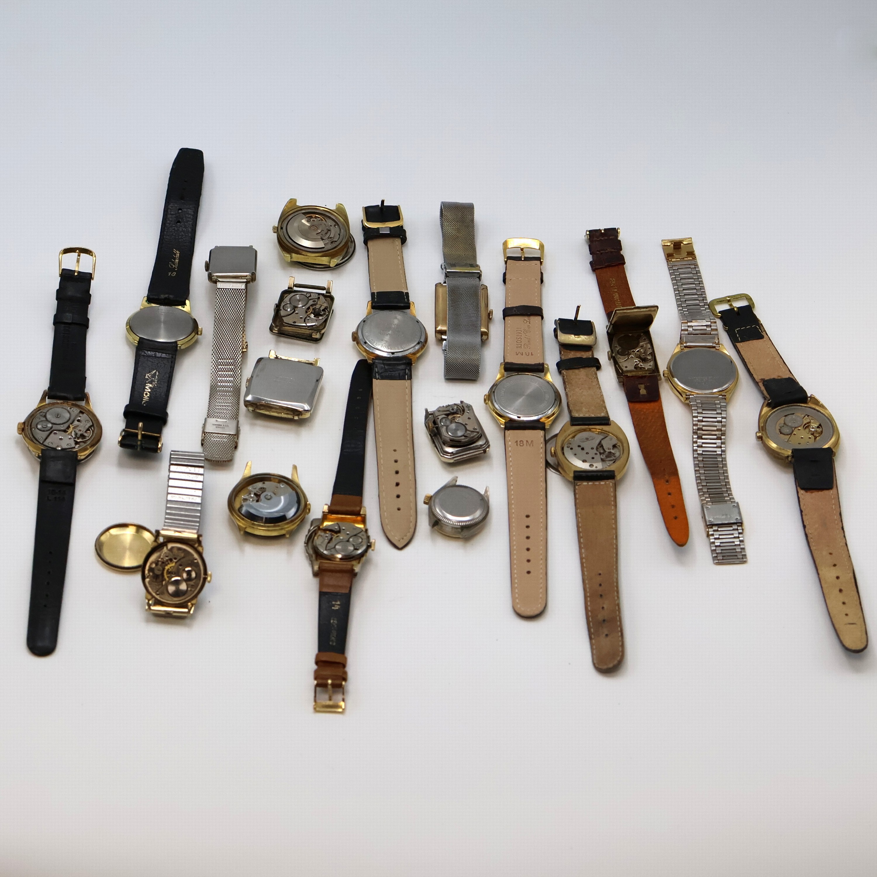 Detail d: 18 vergoldete Armbanduhren verschiedener Marken, Schweiz/Deutschland/USA, 4 x Automatik, 13 x Handaufzug, 1 x Quarz, 15 Geh. m. Stahlboden, davon 6 ...
