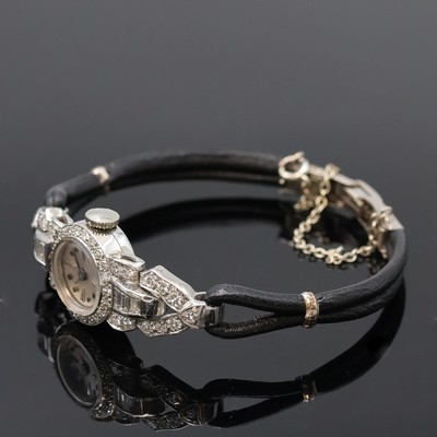 27059092b - Diamantbesetzte Damenarmbanduhr in Platin/ Iridium mit Schließe in WG 585/000, Schweiz ...