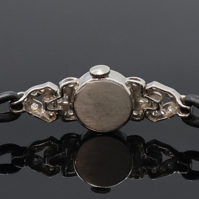 27059092d - Diamantbesetzte Damenarmbanduhr in Platin/ Iridium mit Schließe in WG 585/000, Schweiz ...