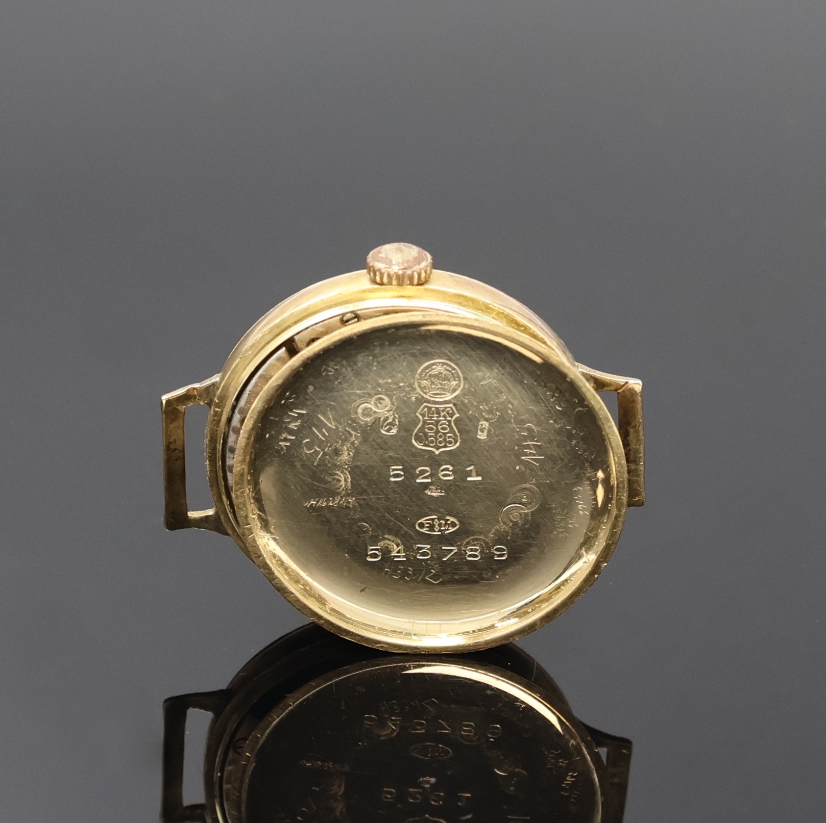 Detail e: MOVADO Chronometre frühe Damenarmbanduhr in GG 585/000, Schweiz um 1920, Handaufzug, 3- tlg. Geh., Boden u. Glasrand aufgedr., gold. Zifferbl. pat., ...
