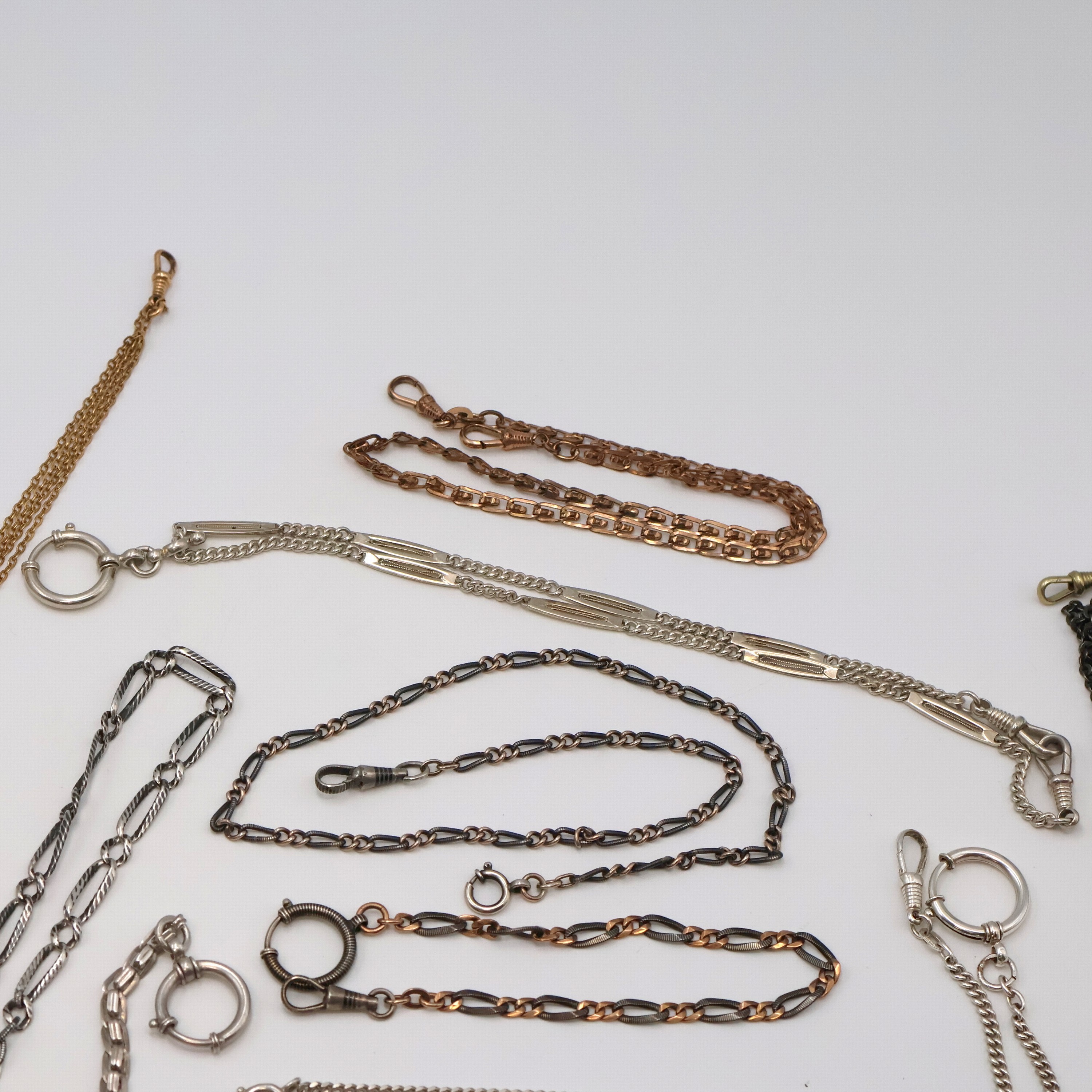 Detail a: Konvolut Taschenuhrketten in Silber, vergoldet und Stahl, um 1890 - 1920, 8 Silberketten, davon 3 x Tula-Silber, eine lange Eisenkette, 5 x ...