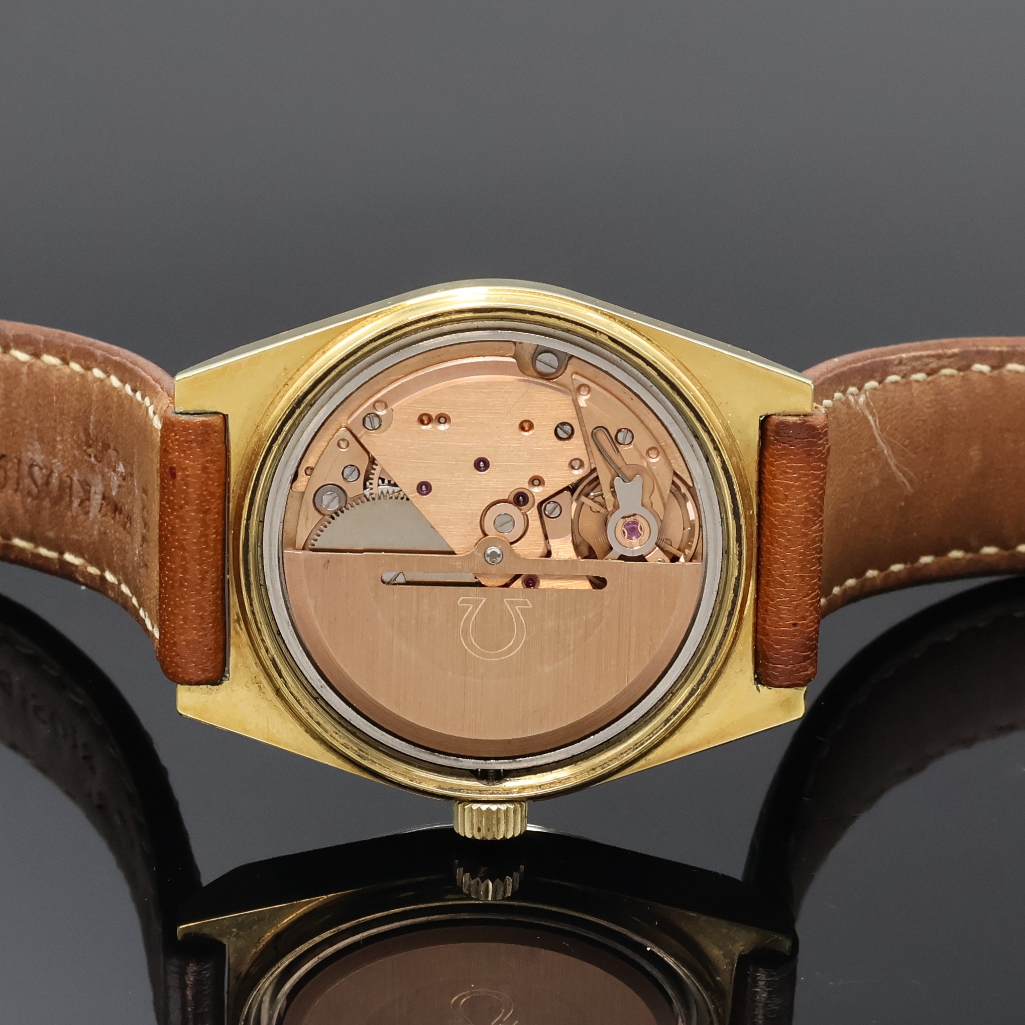 Detail e: OMEGA Geneve vergoldete Herrenarmbanduhr Referenz 1660120, Schweiz um 1972, Automatik, verschr. Geh., orig. Krone u. Glas, silb. Zifferbl., gold. ...