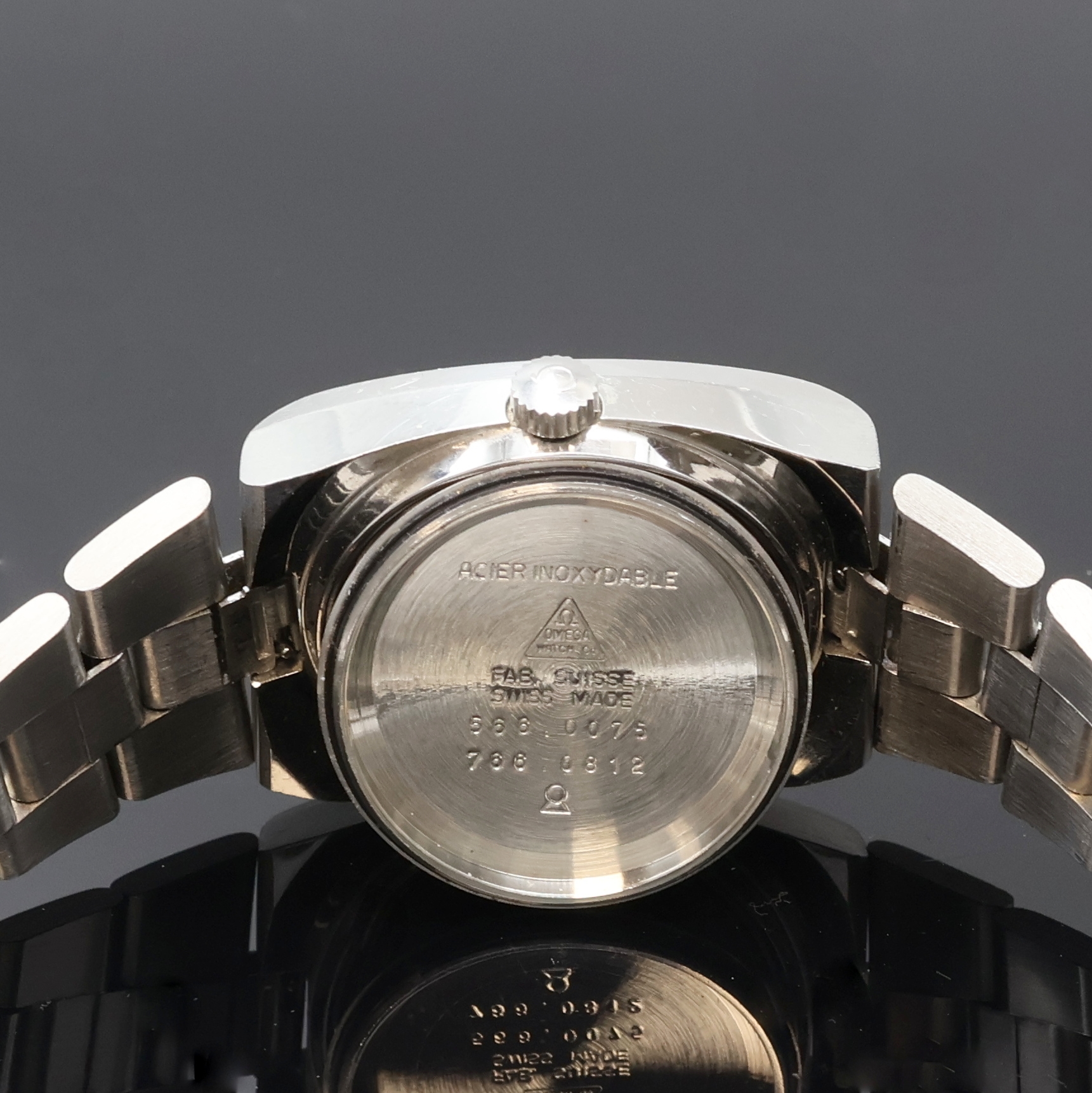Detail g: OMEGA Medium Armbanduhr in Stahl Referenz 566.0075, Schweiz um 1974, Automatik, 2-tlg. Geh., Boden verschr., orig. Krone u. Glas, integr. orig. ...