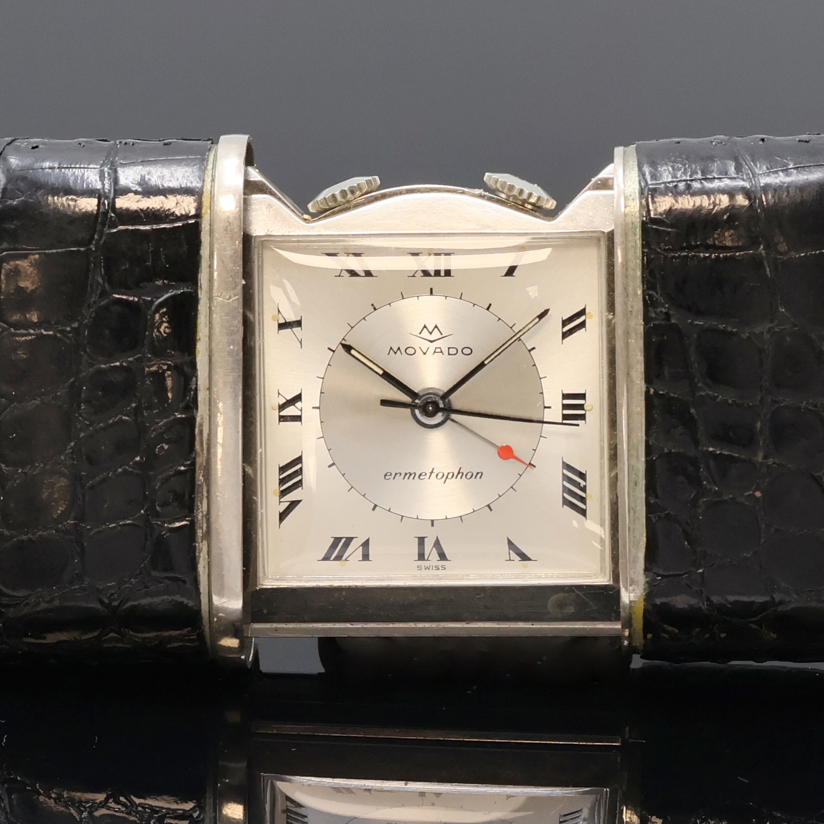 Detail a: MOVADO Ermetophon Schiebeuhr mit Wecker im Nickelgehäuse, Schweiz um 1960, Schiebeaufzug, Leder-bezogenes Geh., rücks. ausklappbarer Aufsteller, ...