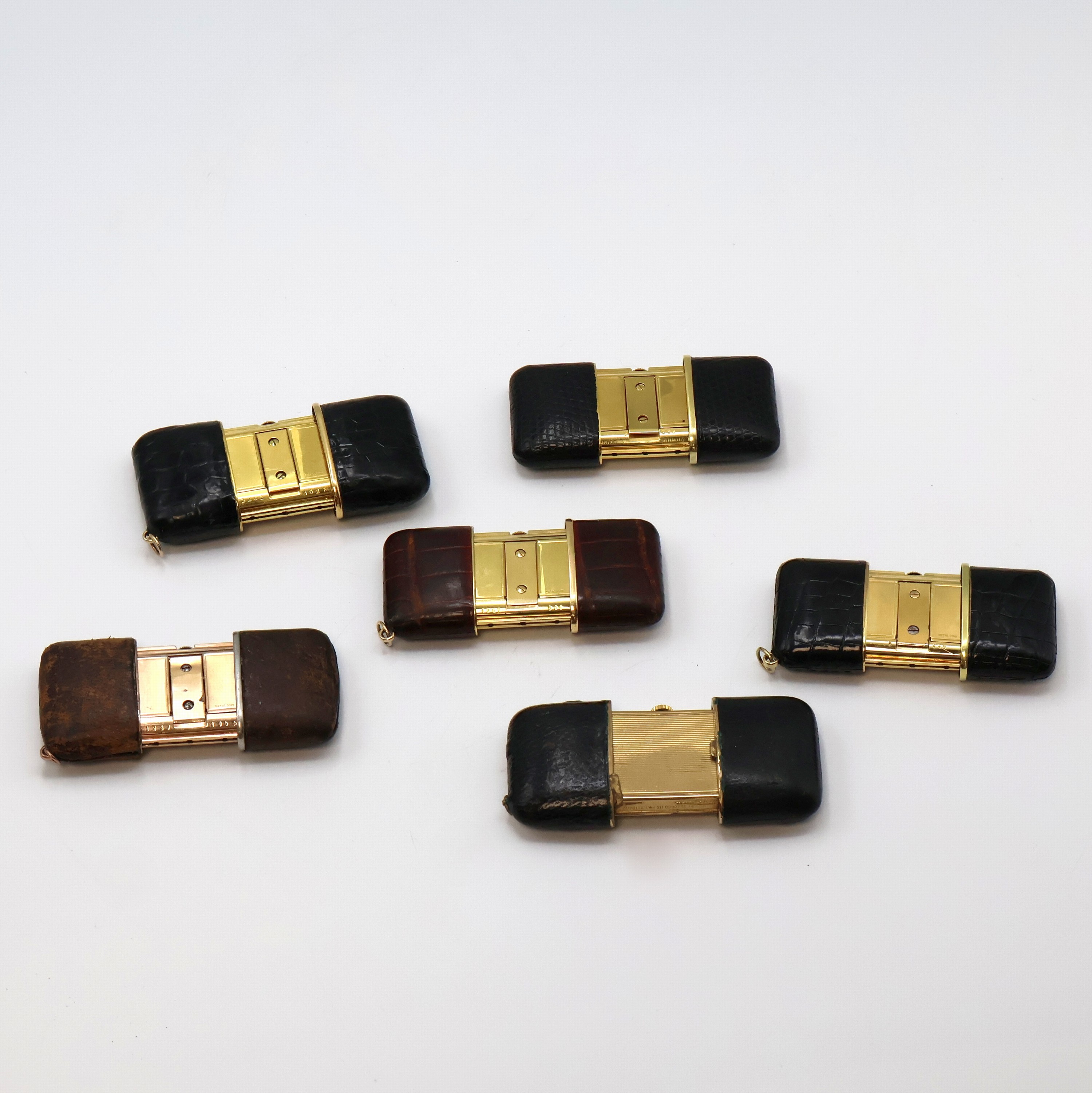 Detail e: 5 MOVADO ERMETO und 1 Pontifa Schiebeuhr, Schweiz um 1930 - 1960, 1 x Handaufzug, 5 x Schiebeaufzug, verg., Leder-bezogene Geh., silb. Zifferbl., 5 x ...