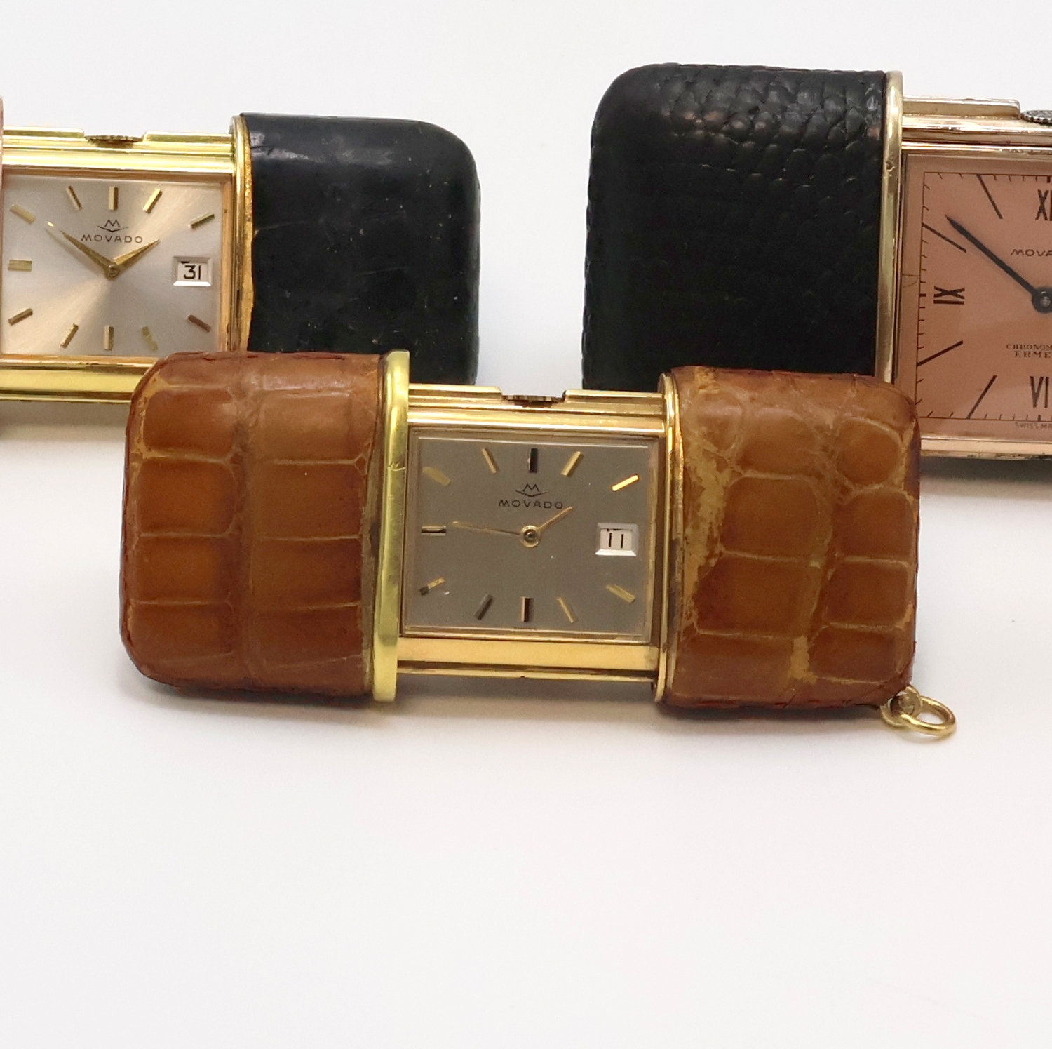 Detail b: 4 Movado ERMETO vergoldete Schiebeührchen, Schweiz um 1930 - 1960, Schiebeaufzug, verg. Geh., 3 x Leder-bezogen, 1 x verg. m. Borken-Struktur, 1 x ...