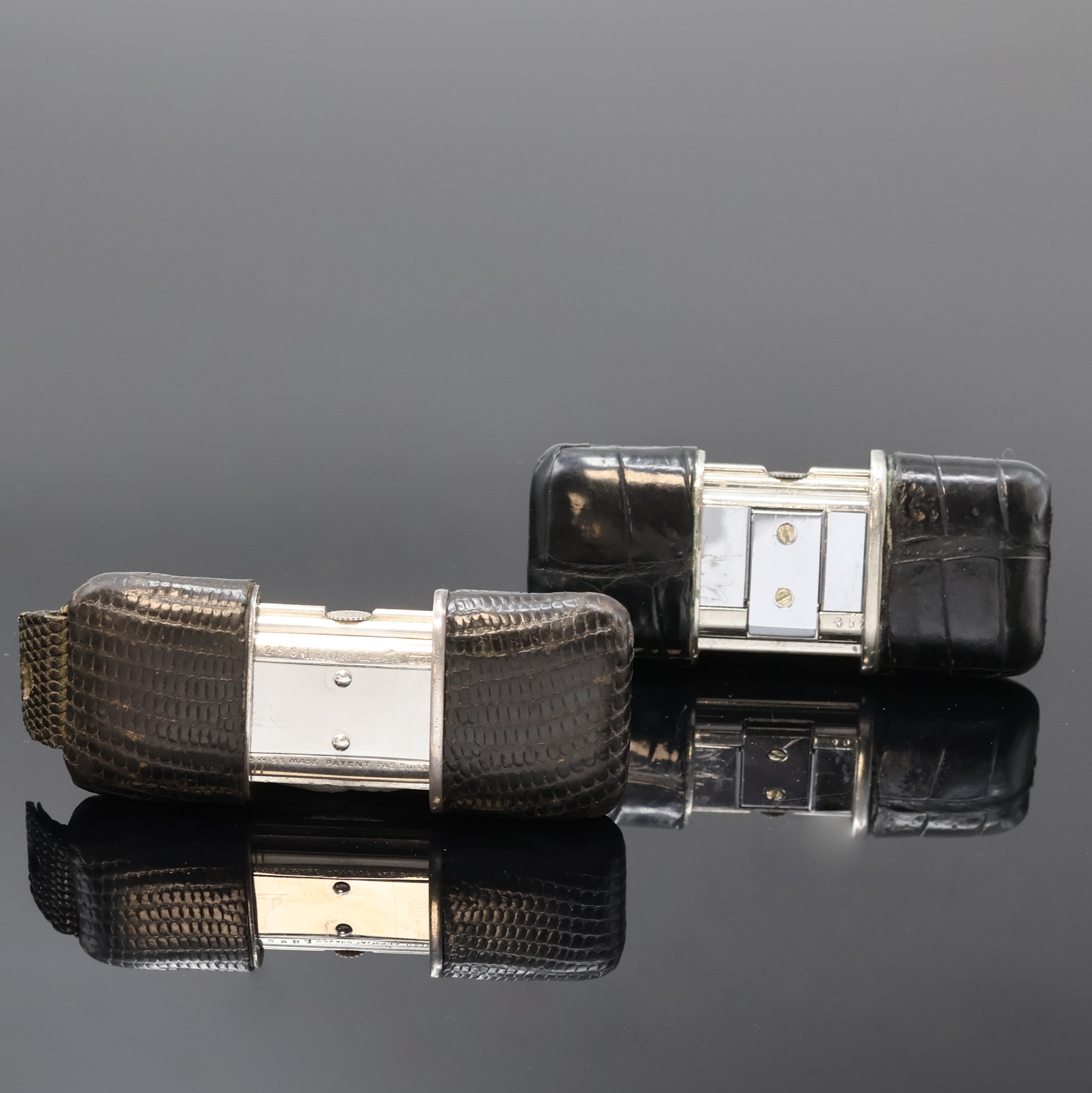 Detail d: 2 MOVADO Ermeto Schiebeührchen in Silber und Nickel, Schweiz um 1930 / 1960, Schiebeaufzug, Leder-bezogene Geh., silb. Zifferbl. m. silb. Zahlen / ...