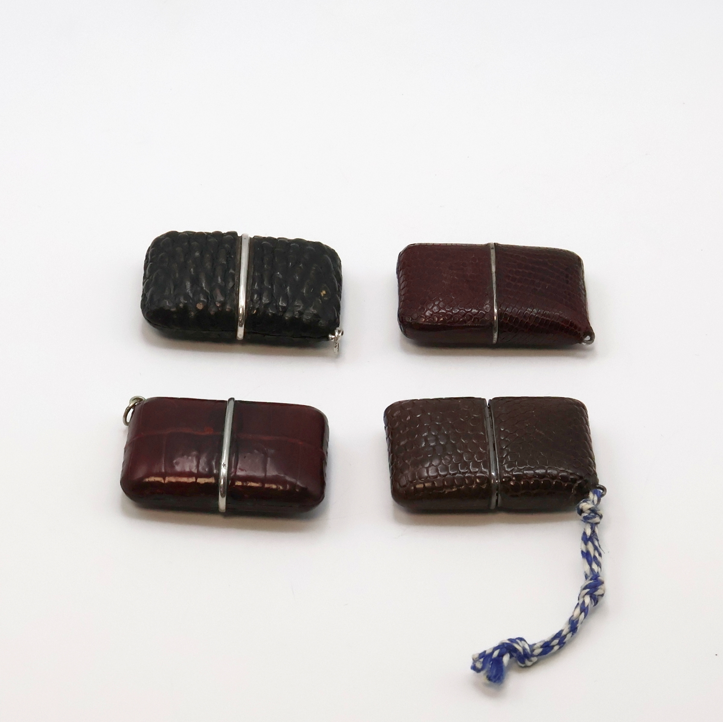 Detail g: 4 MOVADO Ermeto Schiebeührchen in Silber und Nickel, Schweiz um 1930 bis 1950, Schiebeaufzug, Leder-bezogene Geh., davon 3 in Silber, silb. ...