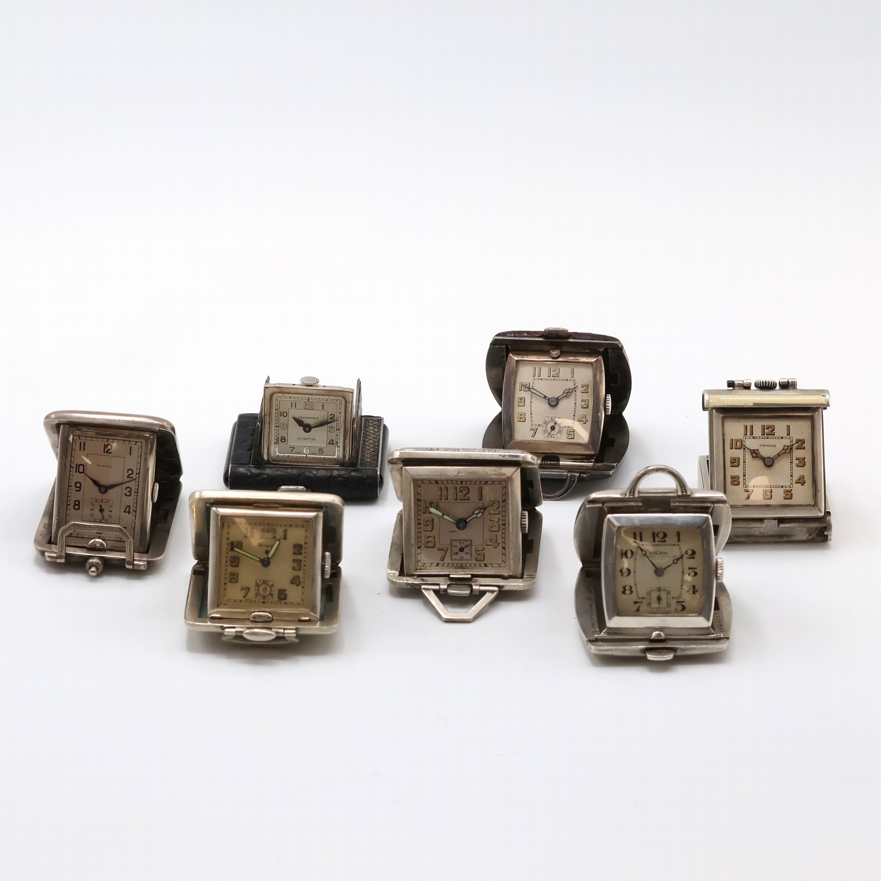 Image 27059162 - 7 travel-watches in silver, Switzerland around 1930, manual winding, silvered dials, ...