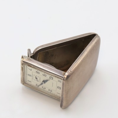 27059162f - 7 travel-watches in silver, Switzerland around 1930, manual winding, silvered dials, ...