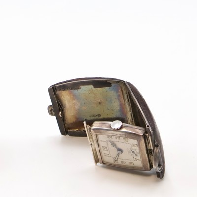 27059162h - 7 travel-watches in silver, Switzerland around 1930, manual winding, silvered dials, ...