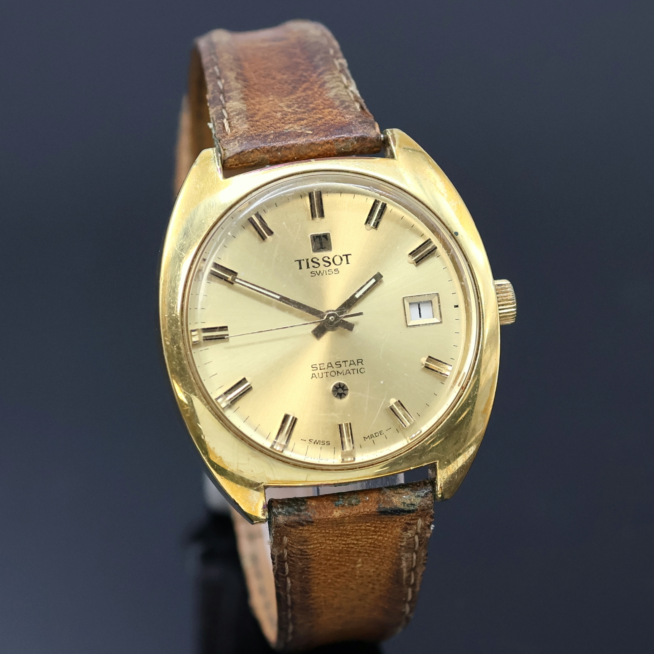 Detail a: TISSOT Seastar vergoldete Herrenarmbanduhr, Schweiz um 1970, Automatik, Boden verschr., champagnerfarb. Zifferbl. m. aufges. Std.- Ind., gold. ...