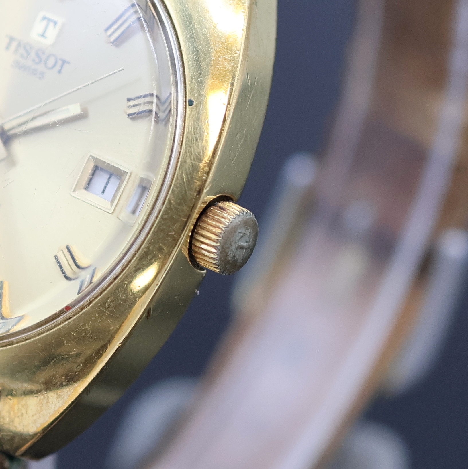 Detail c: TISSOT Seastar vergoldete Herrenarmbanduhr, Schweiz um 1970, Automatik, Boden verschr., champagnerfarb. Zifferbl. m. aufges. Std.- Ind., gold. ...