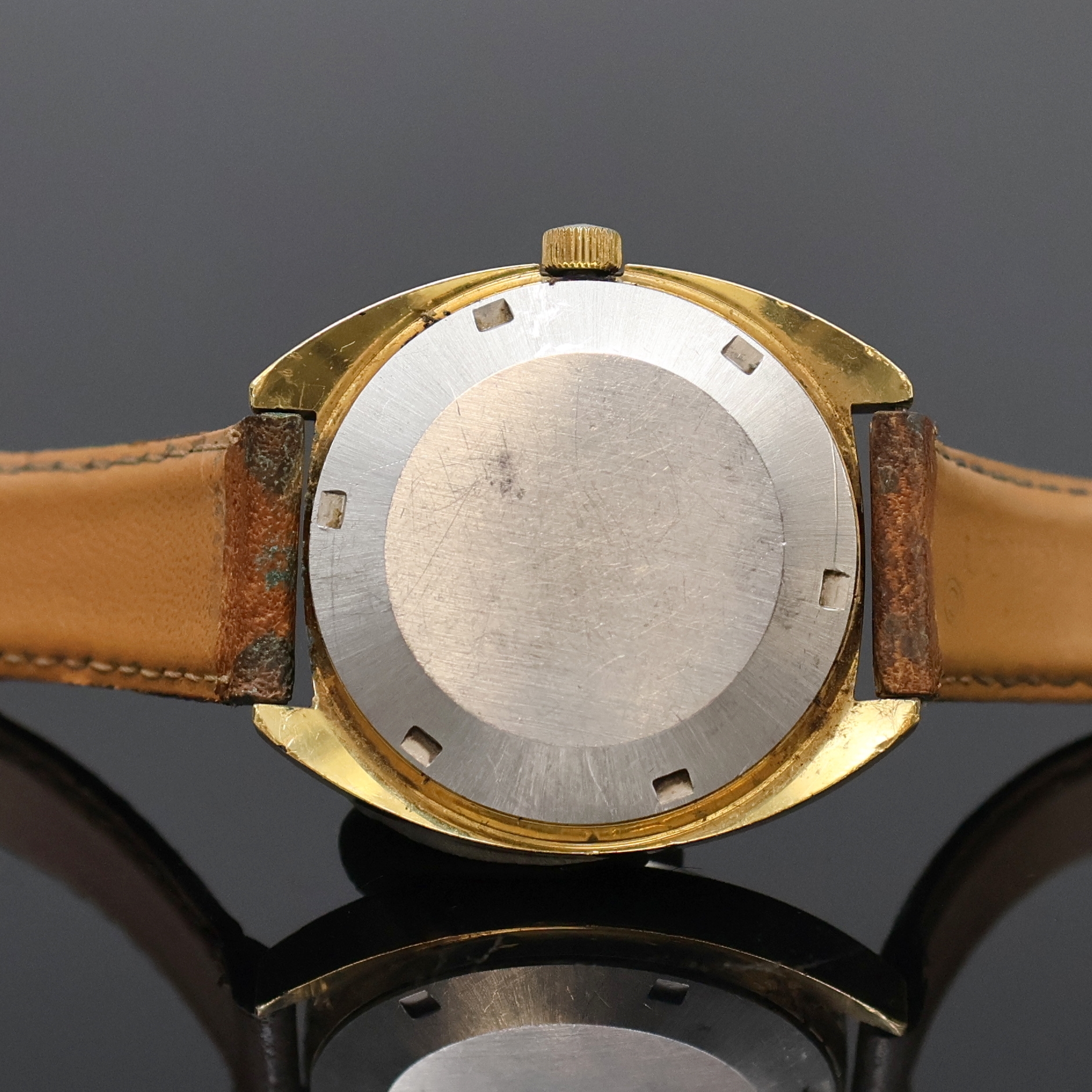 Detail d: TISSOT Seastar vergoldete Herrenarmbanduhr, Schweiz um 1970, Automatik, Boden verschr., champagnerfarb. Zifferbl. m. aufges. Std.- Ind., gold. ...
