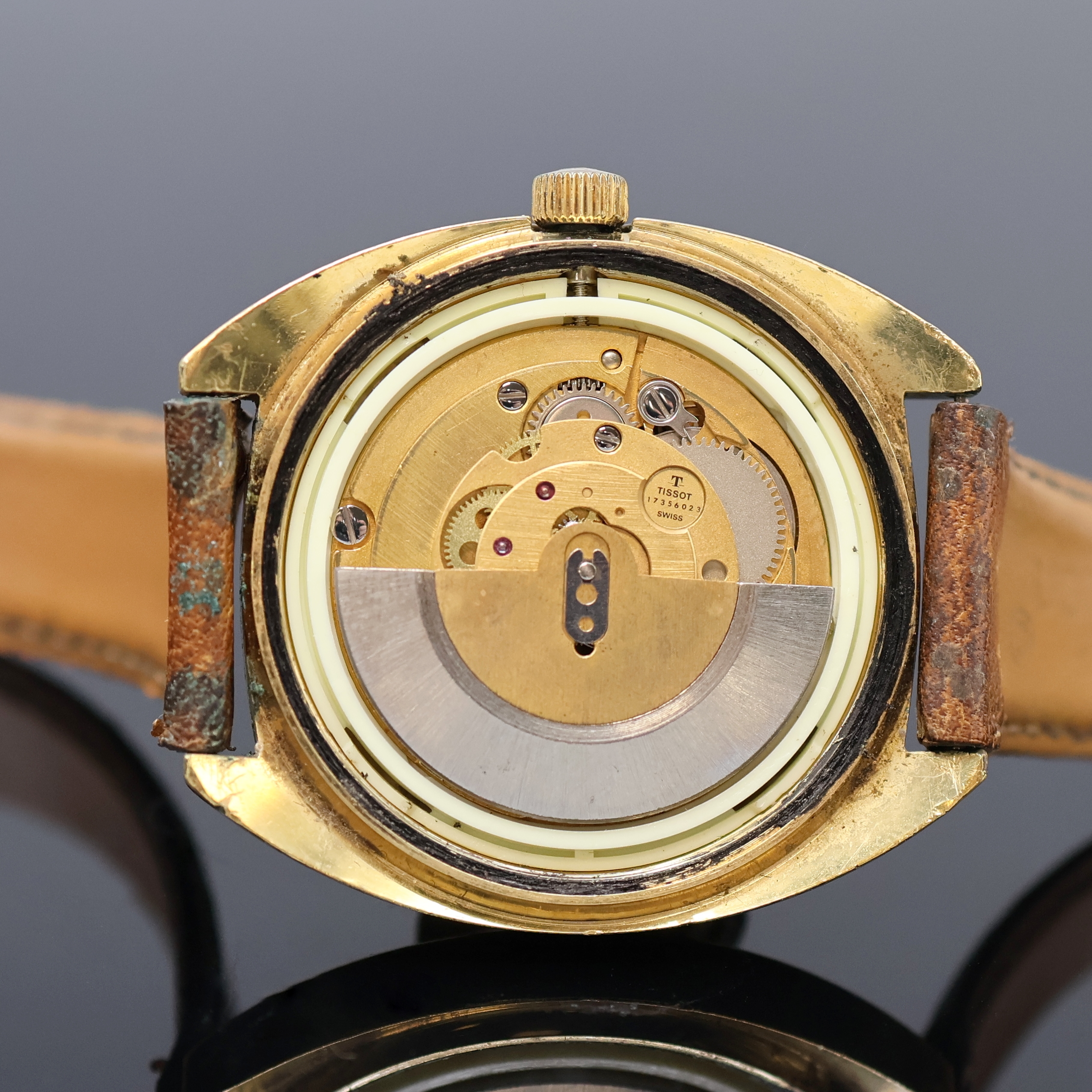 Detail e: TISSOT Seastar vergoldete Herrenarmbanduhr, Schweiz um 1970, Automatik, Boden verschr., champagnerfarb. Zifferbl. m. aufges. Std.- Ind., gold. ...