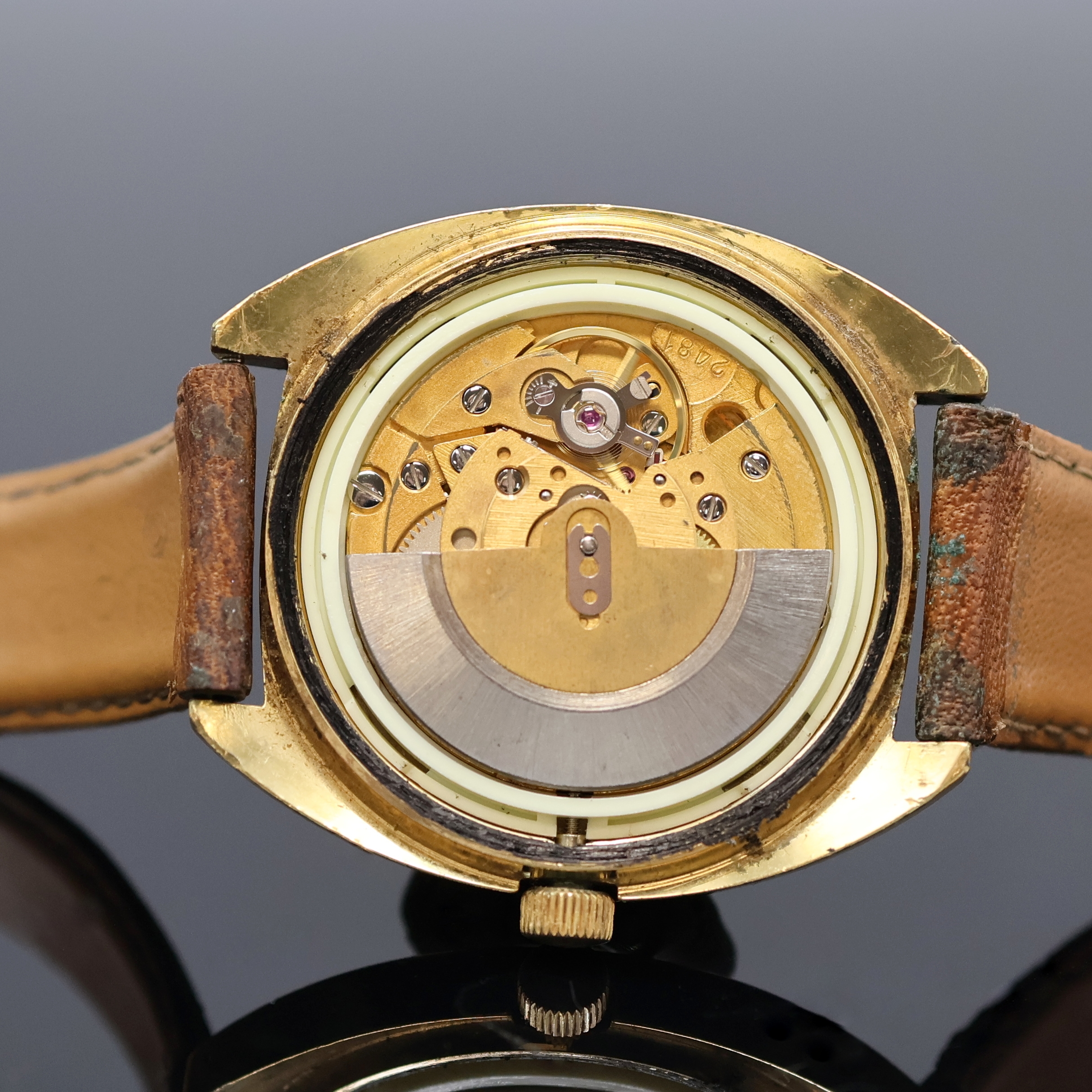 Detail f: TISSOT Seastar vergoldete Herrenarmbanduhr, Schweiz um 1970, Automatik, Boden verschr., champagnerfarb. Zifferbl. m. aufges. Std.- Ind., gold. ...