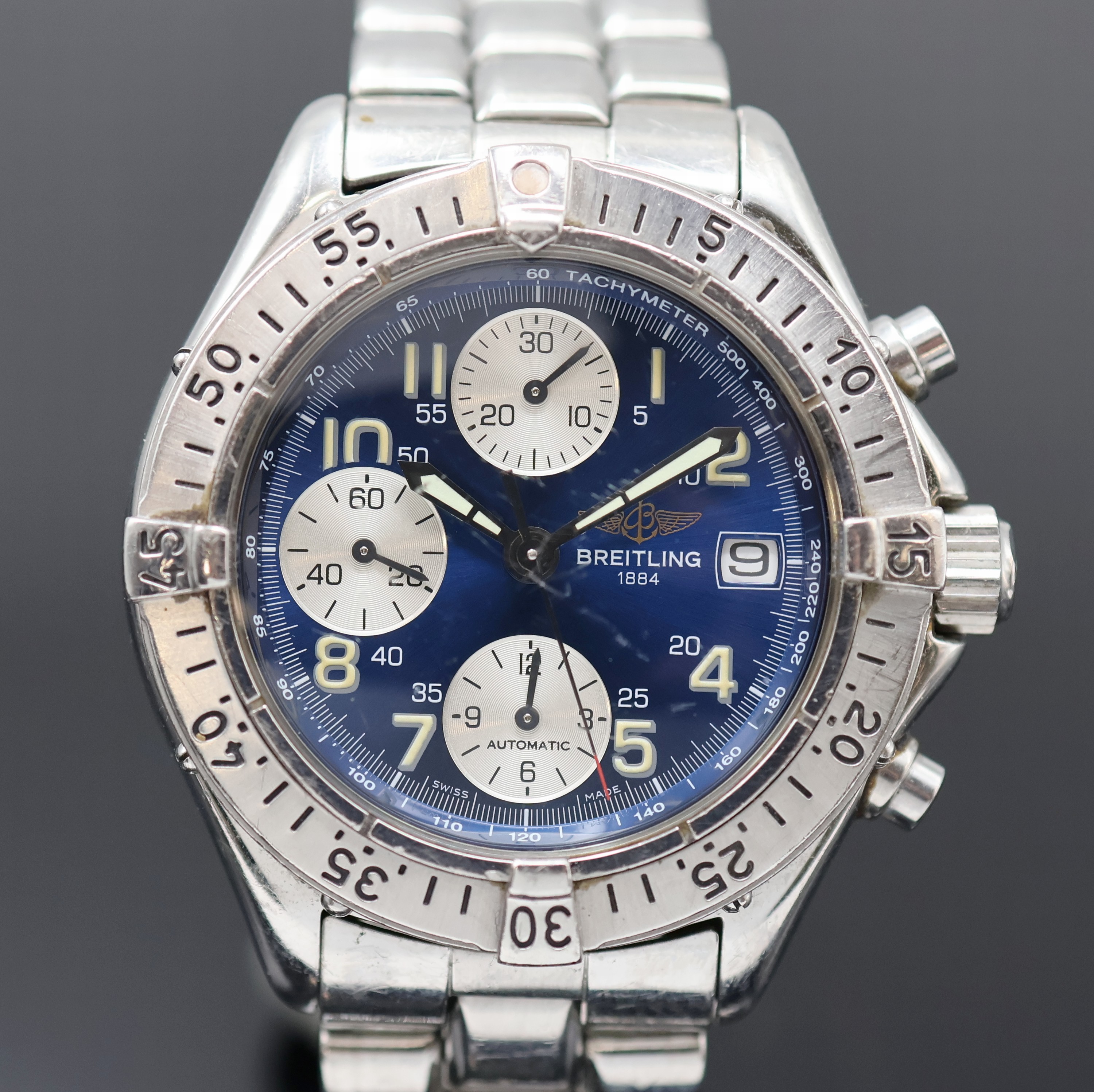 Detail b: BREITLING Colt Herrenchronograph Referenz A13035.1, Schweiz um 1995, Automatik, Edelstahlgeh. inkl. orig. Stahlband m. Faltschl., Boden u. Krone ...
