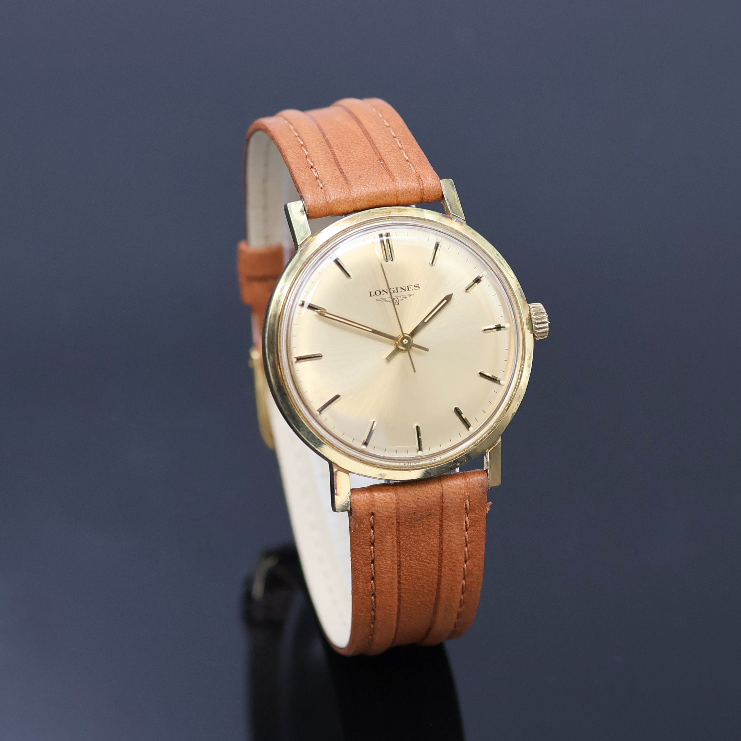 Detail a: LONGINES vergoldete Herrenarmbanduhr Referenz 8359 3, Schweiz um 1970, Handaufzug, Stahlboden verschr., champagnerfarb. Zifferbl. m. aufges. ...