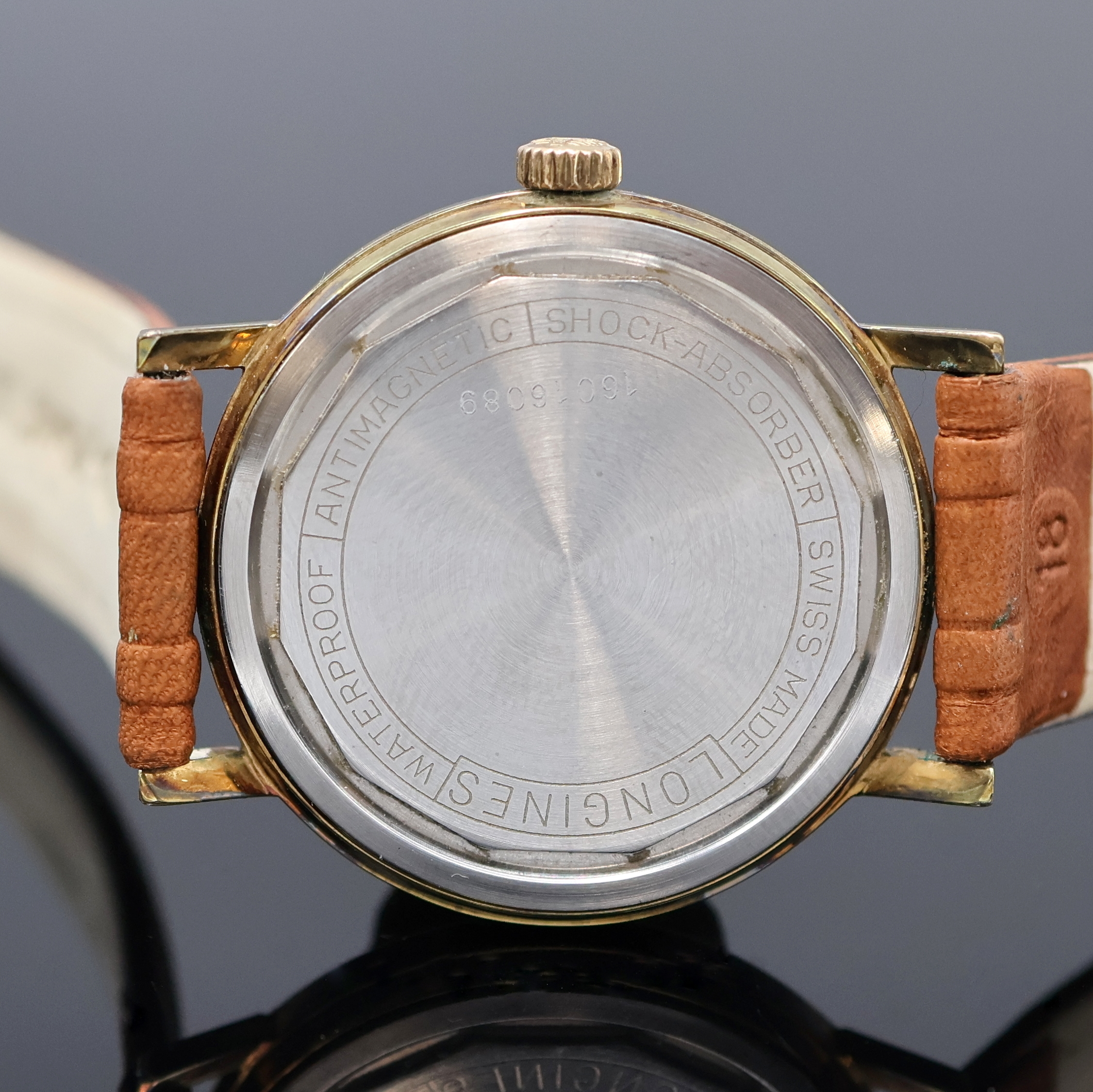 Detail d: LONGINES vergoldete Herrenarmbanduhr Referenz 8359 3, Schweiz um 1970, Handaufzug, Stahlboden verschr., champagnerfarb. Zifferbl. m. aufges. ...