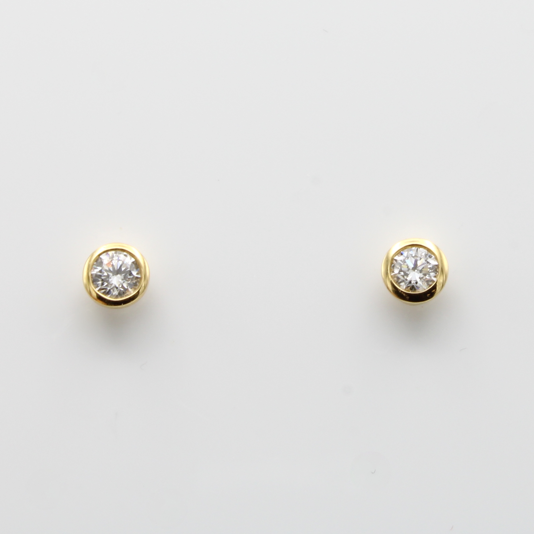 Image 27059779 - Paar Ohrstecker mit Brillantsolitären, GG 750/000, 2 Brill. in Zargenfassungen zus. ca. ...