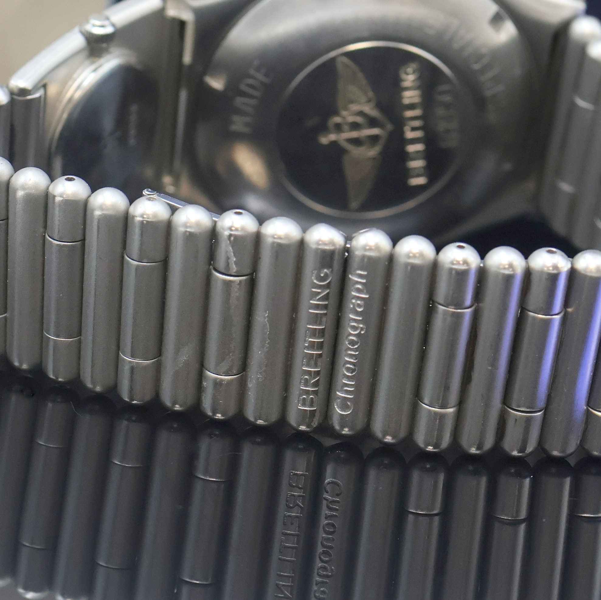 Detail d: BREITLING Herrenarmbanduhr Chronomat Referenz 81950, Schweiz um 1984, Automatik, Stahlgeh. inkl. Roleauxband m. UTC und dopp. Faltschl., zus. 2 ...