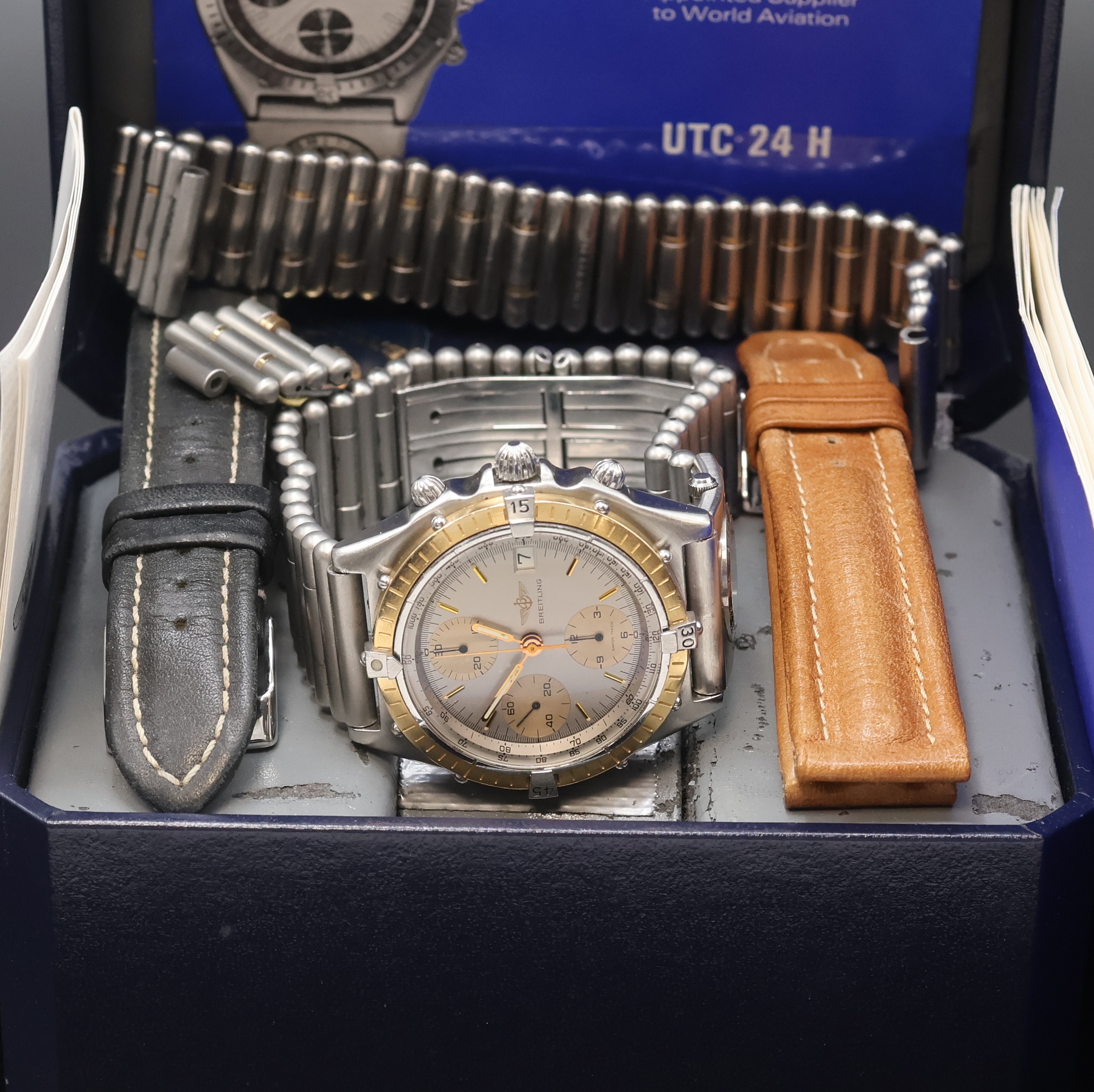 Detail f: BREITLING Herrenarmbanduhr Chronomat Referenz 81950, Schweiz um 1984, Automatik, Stahlgeh. inkl. Roleauxband m. UTC und dopp. Faltschl., zus. 2 ...