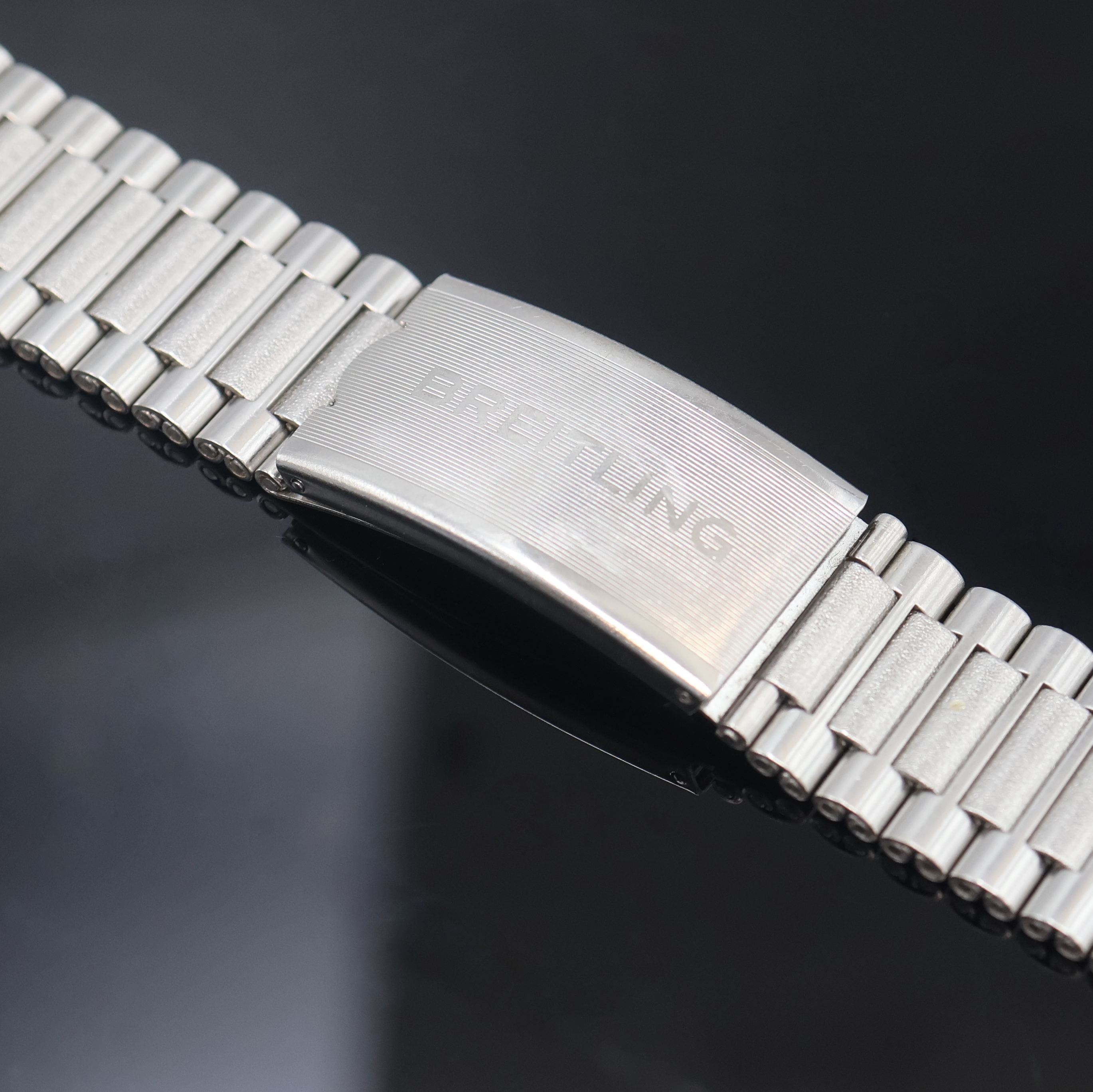 Detail a: BREITLING vintage Gliederband aus Stahl, Faltschl. m. Dehnungsausgleich, Bandanstoß ca. 22 mm, L. ca. 14,5 cm, EZ 2, aus Sammlungsauflösung