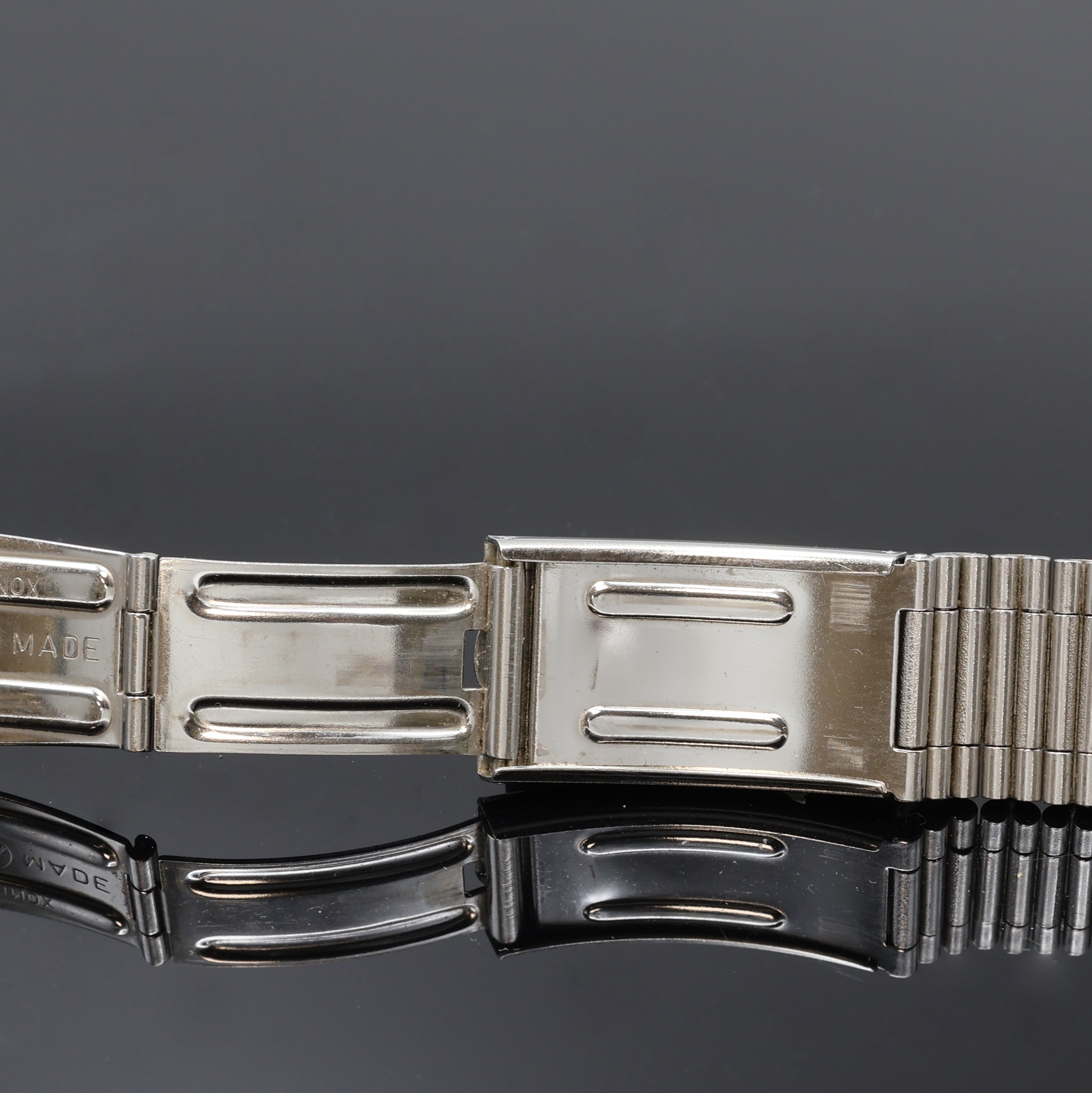 Detail d: BREITLING vintage Gliederband aus Stahl, Faltschl. m. Dehnungsausgleich, Bandanstoß ca. 22 mm, L. ca. 14,5 cm, EZ 2, aus Sammlungsauflösung
