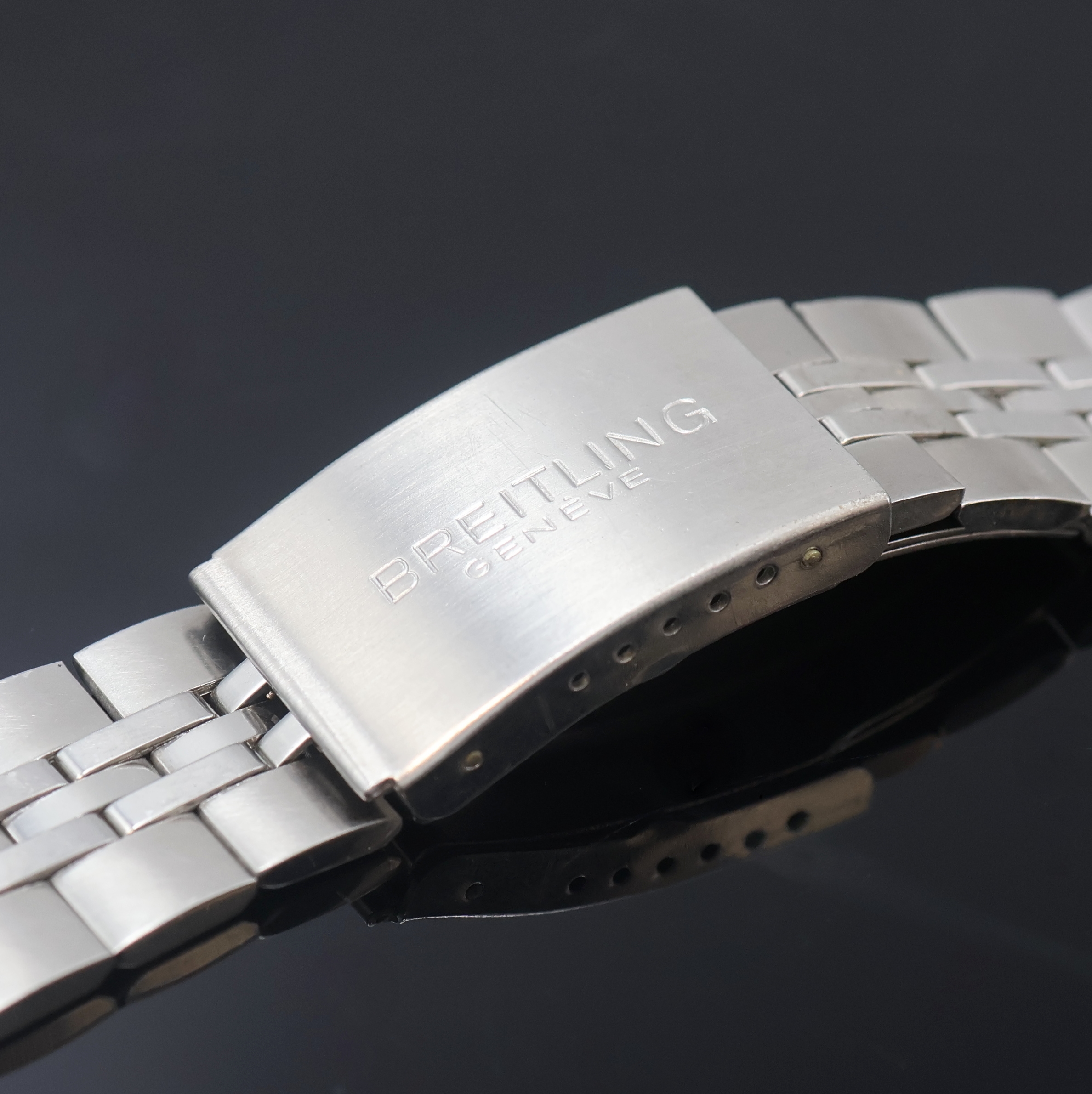 Detail a: BREITLING vintage Gliederband aus Stahl, Faltschl., Bandanstoß ca. 22 mm, L. ca. 15 cm, EZ 2, aus Sammlungsauflösung