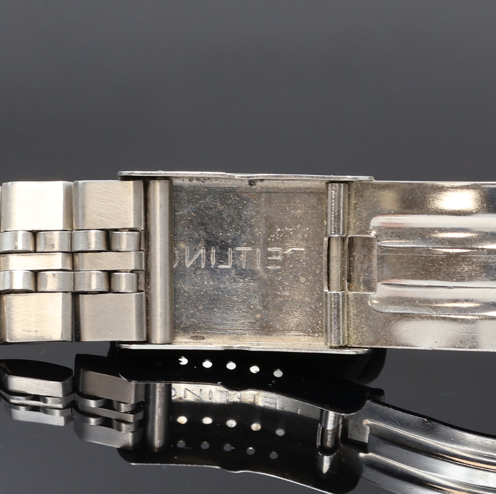 Detail d: BREITLING vintage Gliederband aus Stahl, Faltschl., Bandanstoß ca. 22 mm, L. ca. 15 cm, EZ 2, aus Sammlungsauflösung