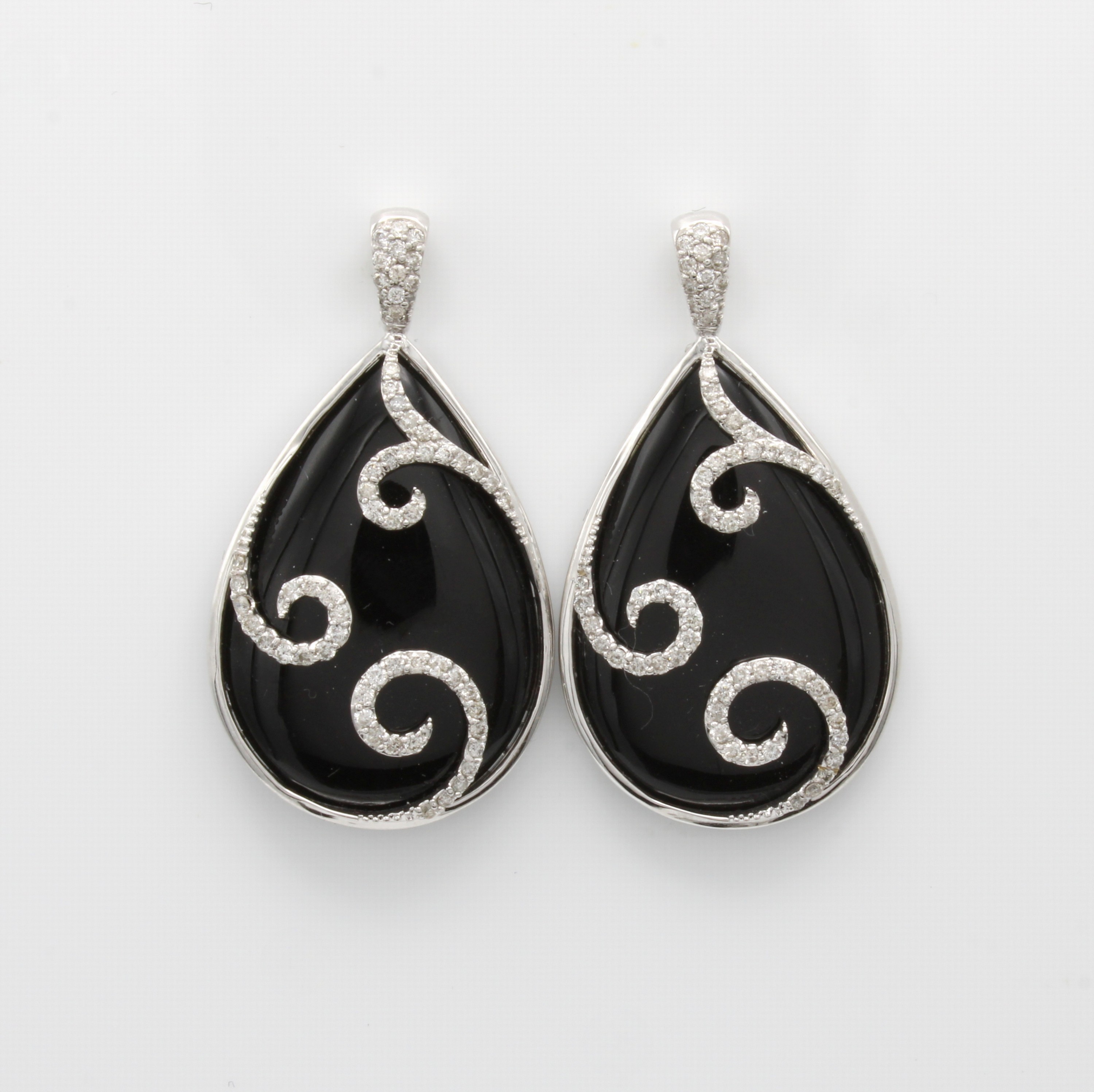 Image 27060449 - Paar Ohrstecker mit Onyxen und Brillanten, WG 750/000, 2 tropfenförm. Onyxscheiben zus. ...