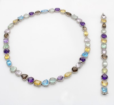 27060427a - Set bestehend aus: Collier und Armband mit Farbsteinen und Brillanten, WG 750/000, als ...