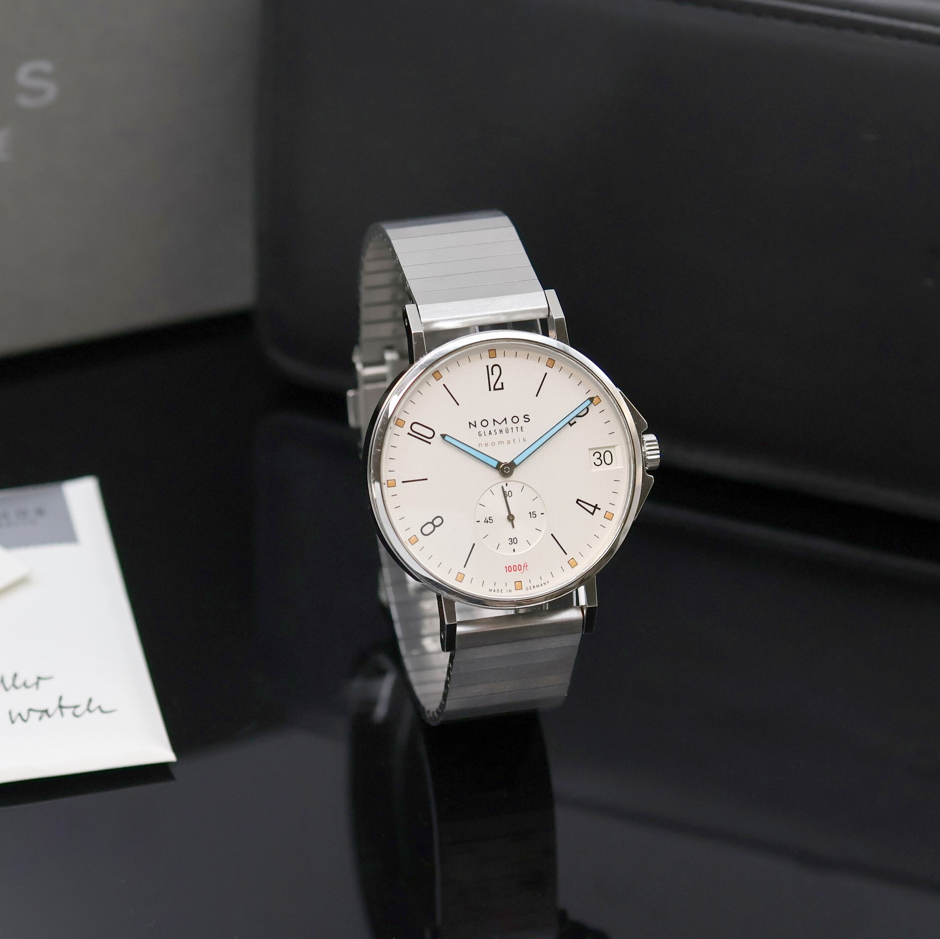 Detail a: NOMOS Tangente Herrenarmbanduhr Sport Neomatik 42 Referenz 580, Deutschland um 2020, Automatik, beids. vergl. Edelstahlgeh. inkl. Gliederband m. ...