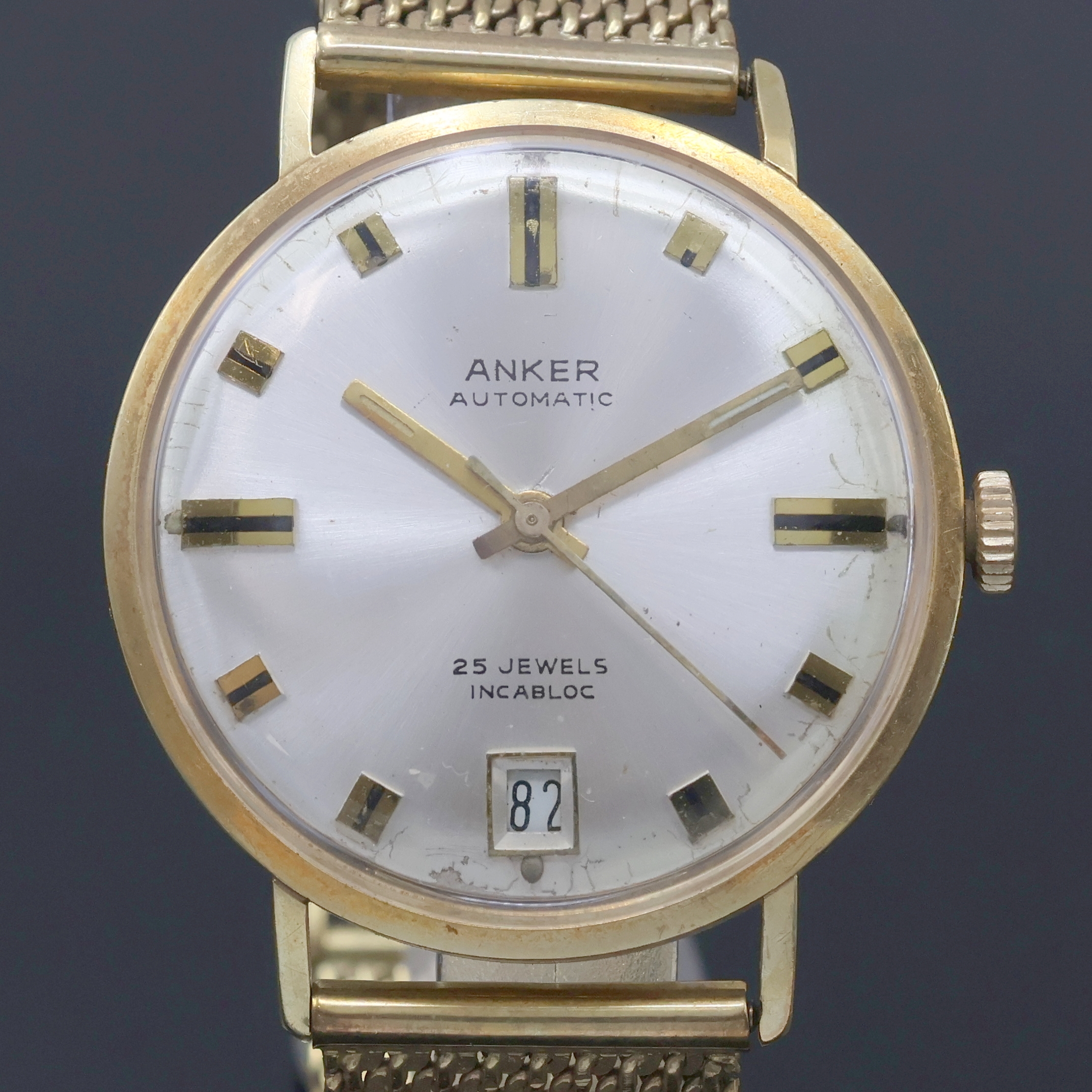 Detail a: ANKER Armbanduhr in GG 585/000 an GG 333/000 Band, Schweiz um 1965, Automatik, Boden aufgedr., silb. Zifferbl. m. aufges. Std.- Ind., gold. ...