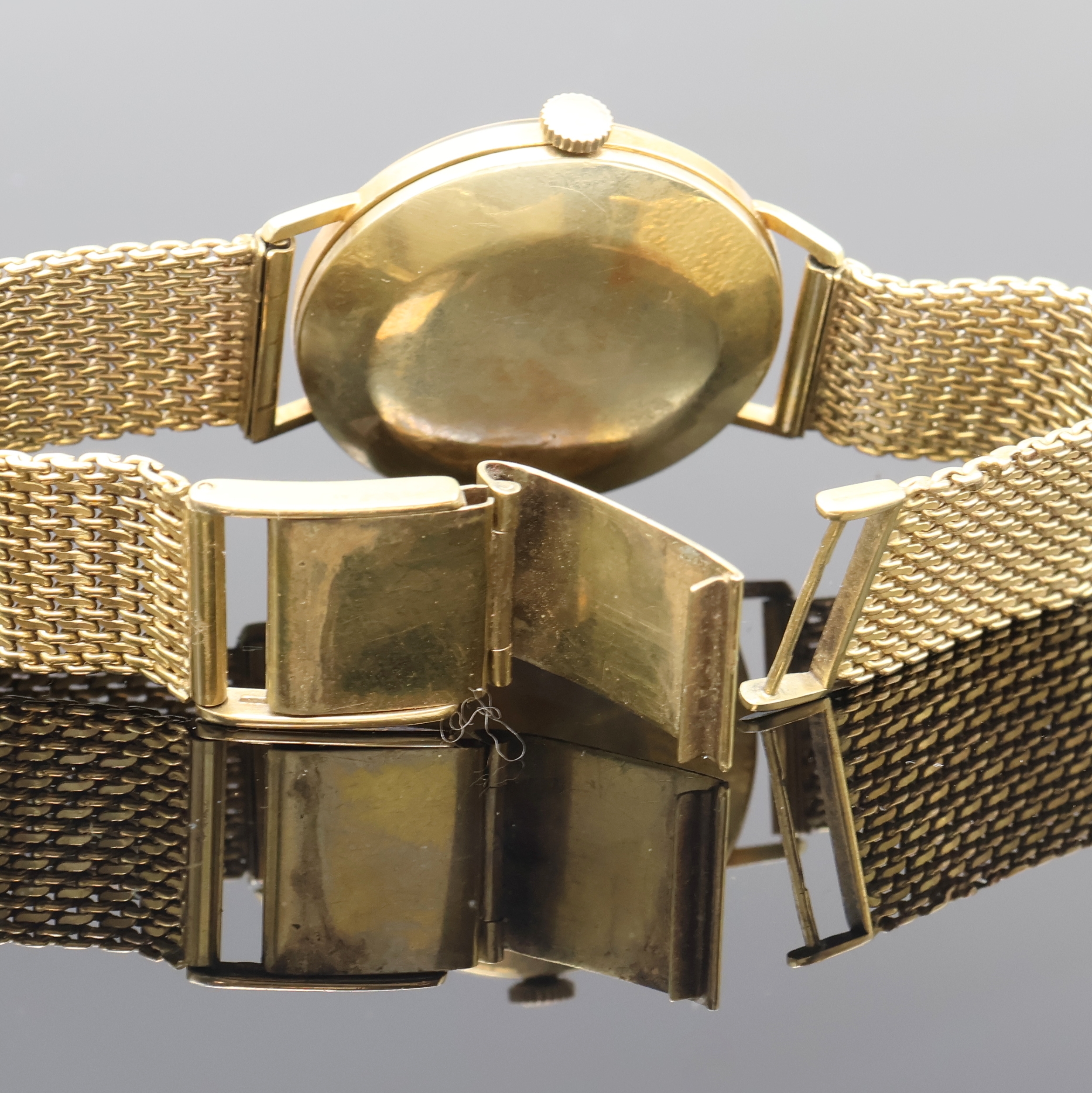 Detail d: ANKER Armbanduhr in GG 585/000 an GG 333/000 Band, Schweiz um 1965, Automatik, Boden aufgedr., silb. Zifferbl. m. aufges. Std.- Ind., gold. ...