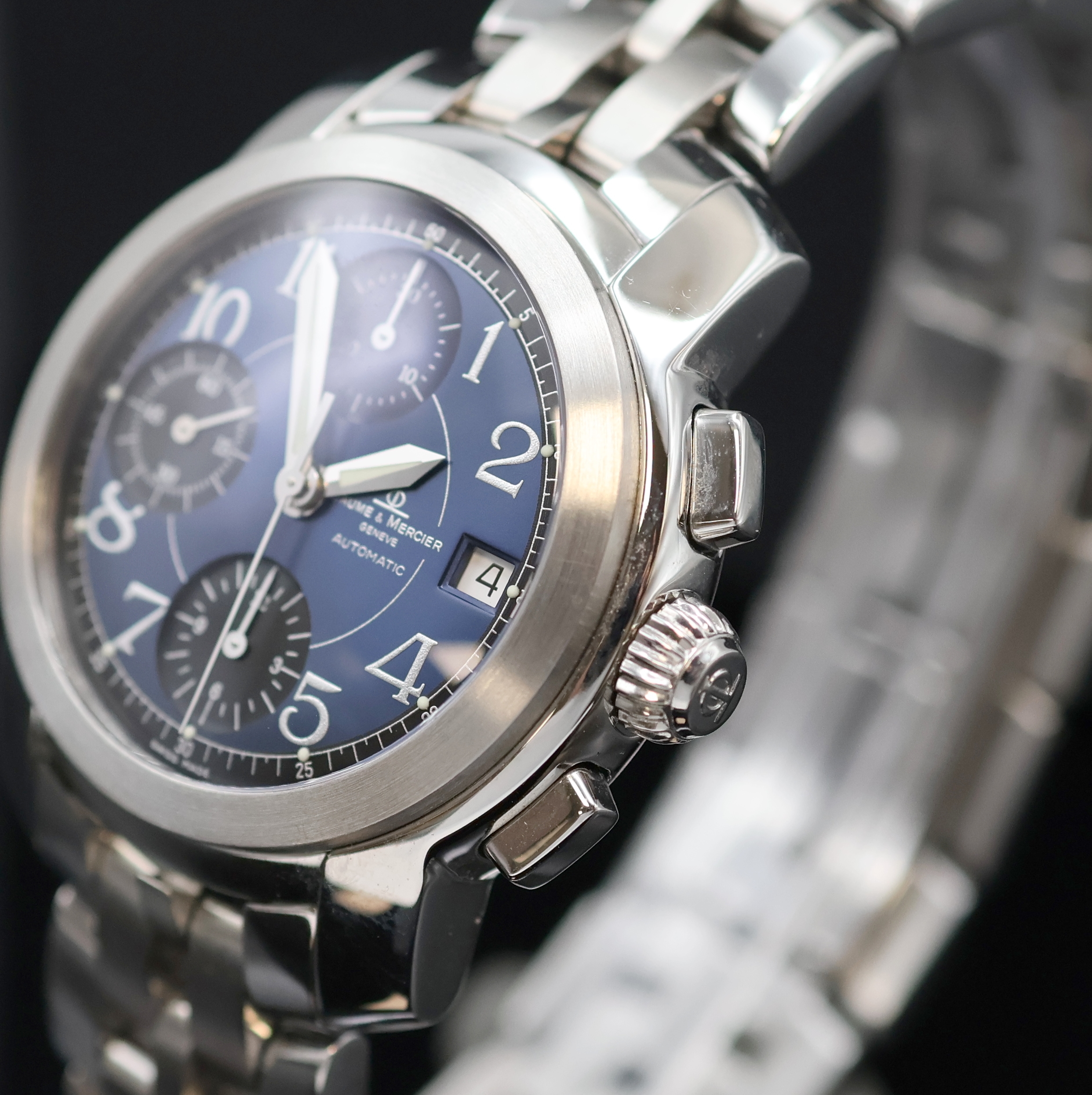 Detail c: BAUME & MERCIER Capeland Armbandchronograph in Stahl Referenz MV045216, Schweiz um 2000, Automatik, Boden u. Krone verschr., orig. Gliederband m. ...