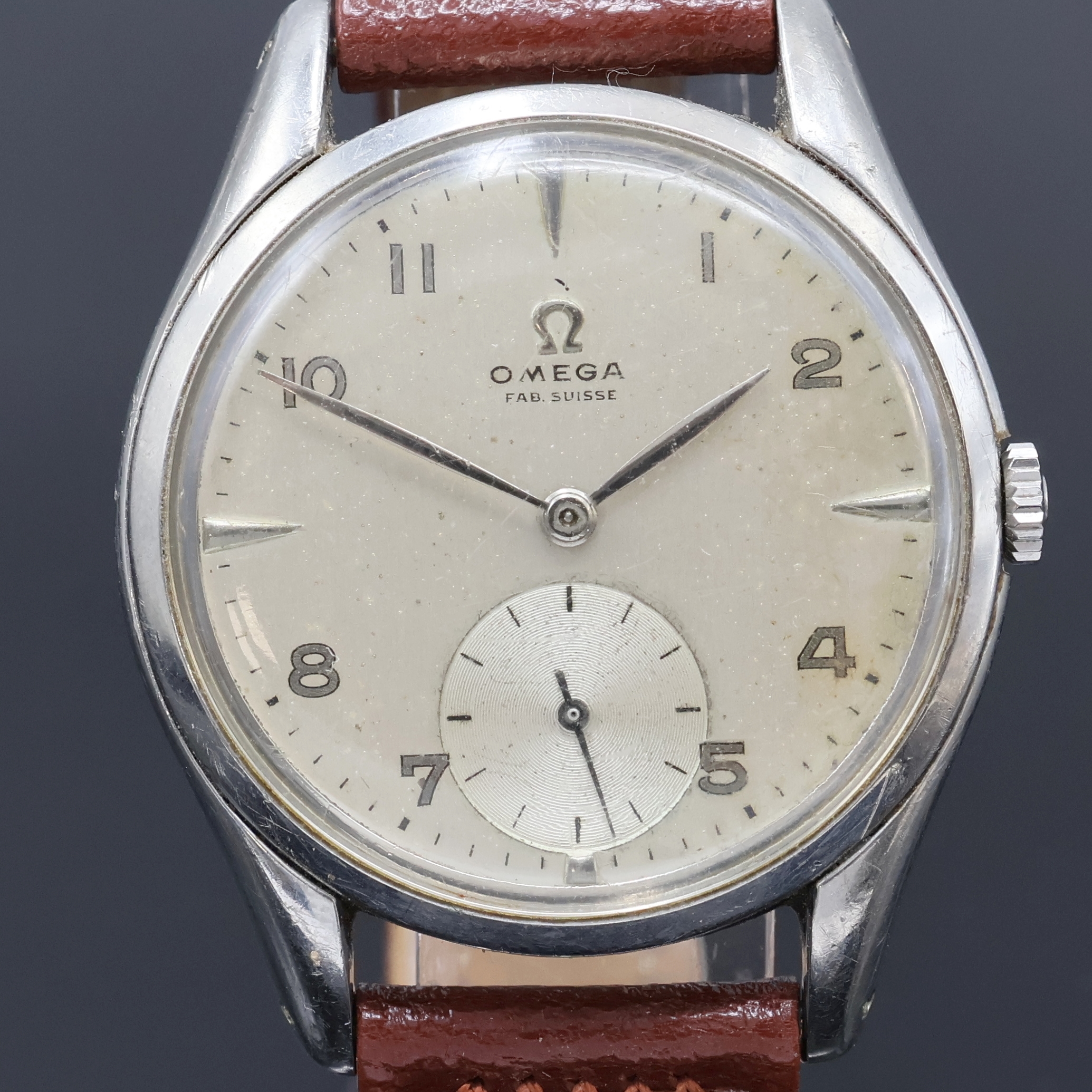 Detail a: OMEGA Armbanduhr Referenz 2503-5, Schweiz um 1950, Handaufzug, Edelstahlgeh., Boden aufgedr., silb. Zifferbl. rest./pat., arab. Zahlen, silb. Zeiger, ...