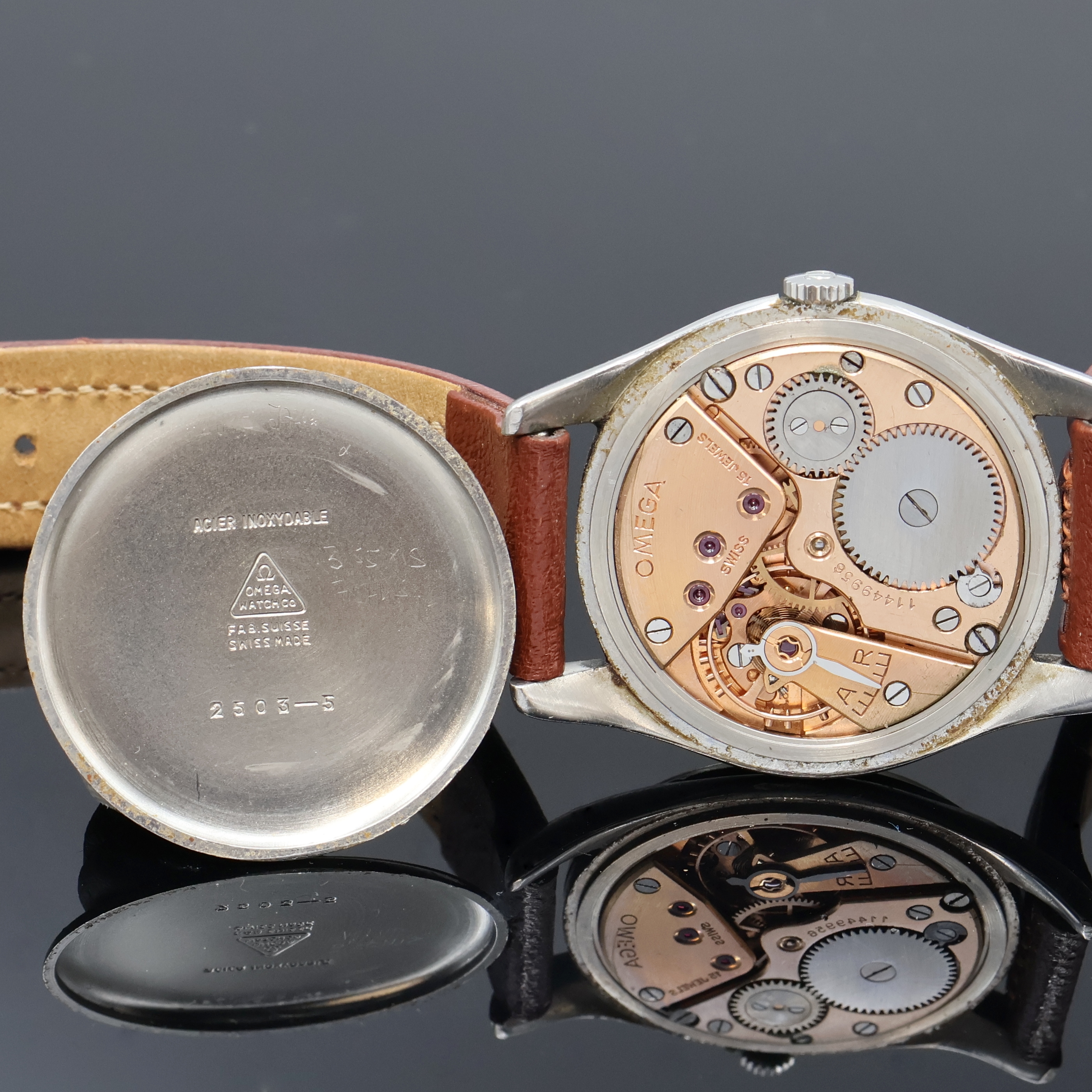 Detail d: OMEGA Armbanduhr Referenz 2503-5, Schweiz um 1950, Handaufzug, Edelstahlgeh., Boden aufgedr., silb. Zifferbl. rest./pat., arab. Zahlen, silb. Zeiger, ...