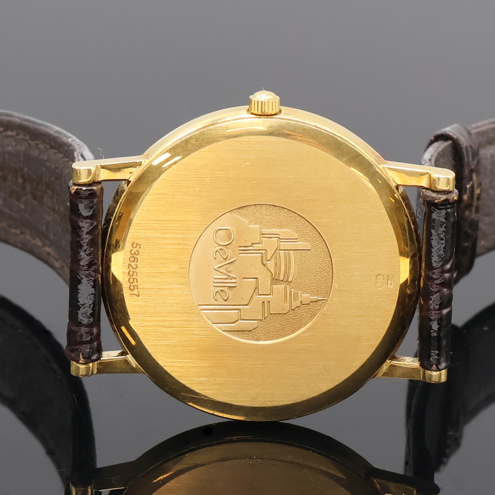 Detail c: OMEGA De Ville Armbanduhr in GG 750/000 Referenz 196.2379, Schweiz um 1990, quarz, Boden aufgedr., cremefarb. Zifferbl. m. gold. Std.-Ind. u. röm. ...