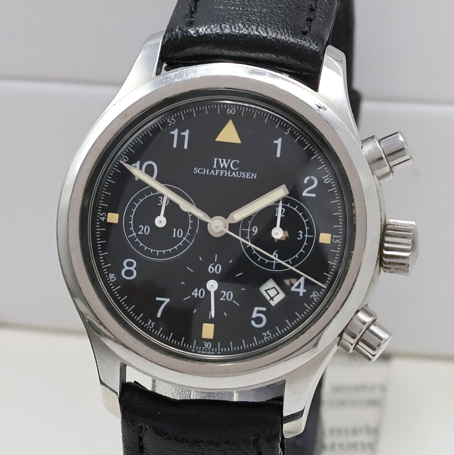 Detail a: IWC Herrenarmbanduhr "Der Fliegerchronograph" Referenz 3740, Edelstahlgeh. inkl. orig. Lederband m. orig. Dornschl., Boden und Krone ...