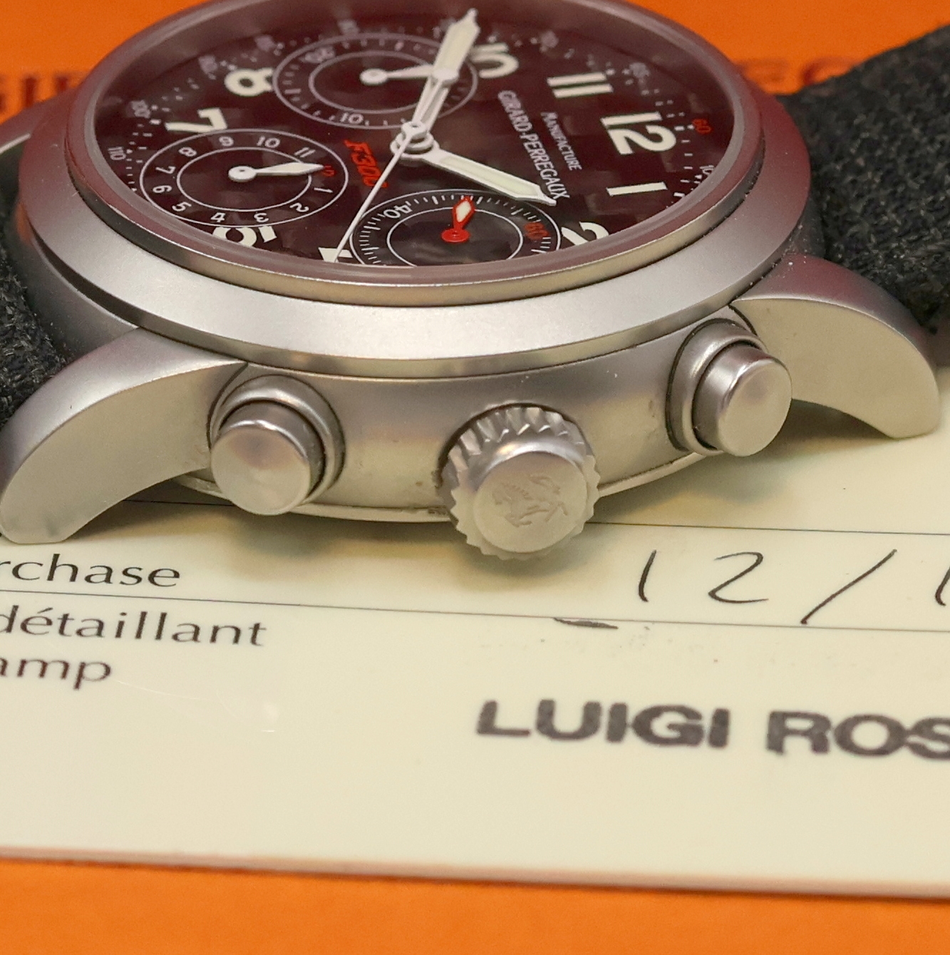Detail c: GIRARD PERREGAUX Ferrari Herrenarmbanduhr mit Chronograph Referenz 8020, Automatik, Edelstahlgeh. inkl. orig. Leder-/Textilband m. orig. Dornschl., ...