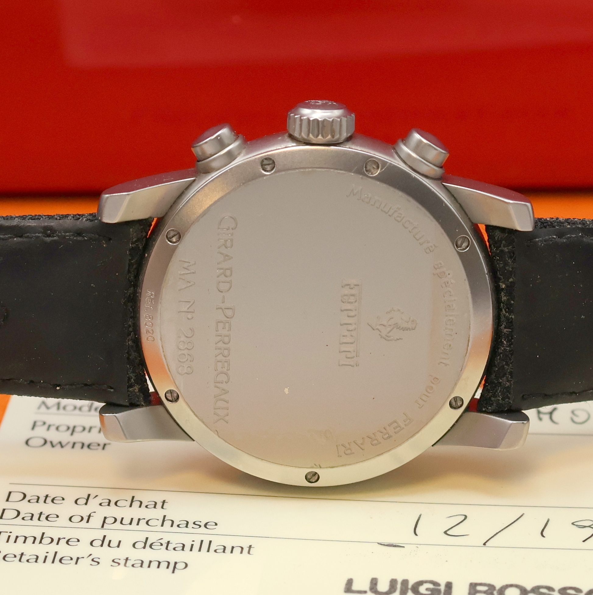 Detail d: GIRARD PERREGAUX Ferrari Herrenarmbanduhr mit Chronograph Referenz 8020, Automatik, Edelstahlgeh. inkl. orig. Leder-/Textilband m. orig. Dornschl., ...