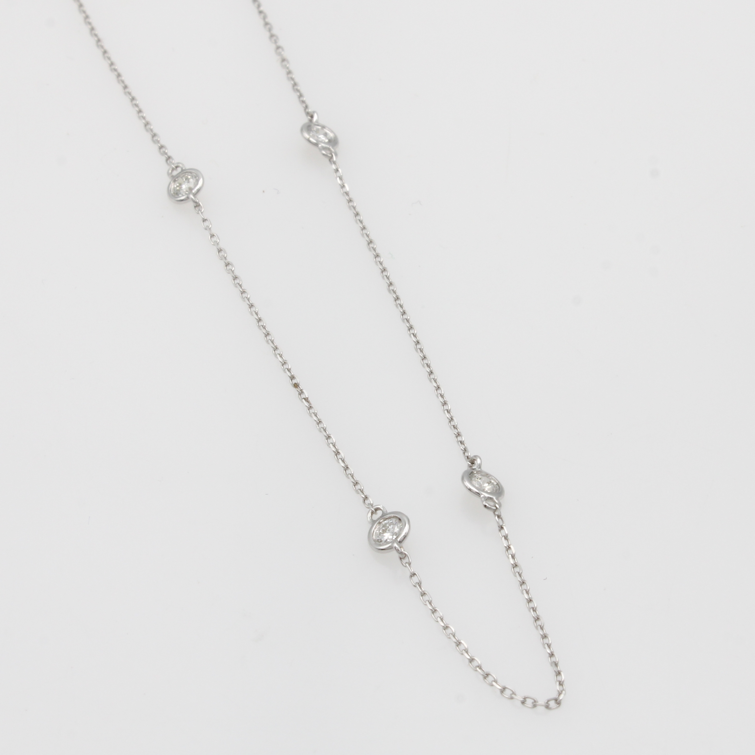 Image 27061021 - Kette mit Brillanten, WG 750/000, 9 Brill. in Zargenfassungen zus. ca. 0.35 ct feines ...