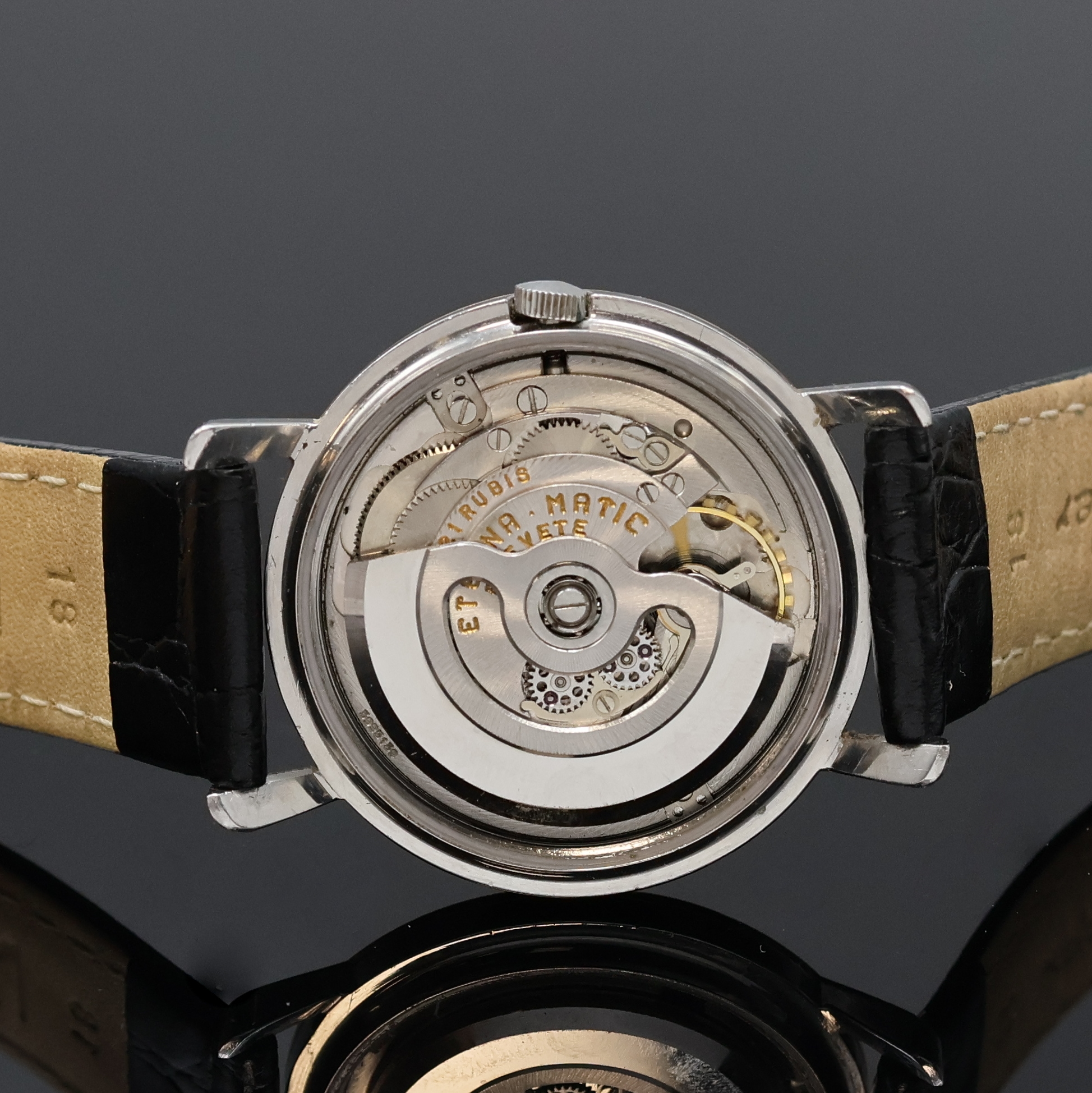 Detail d: ETERNA-MATIC Chronometer Armbanduhr, Schweiz um 1958, Automatik, Edelstahlgeh., Lünette wie Bandanst. mit Goldhaube, vers. Zifferblatt m. aufges. ...