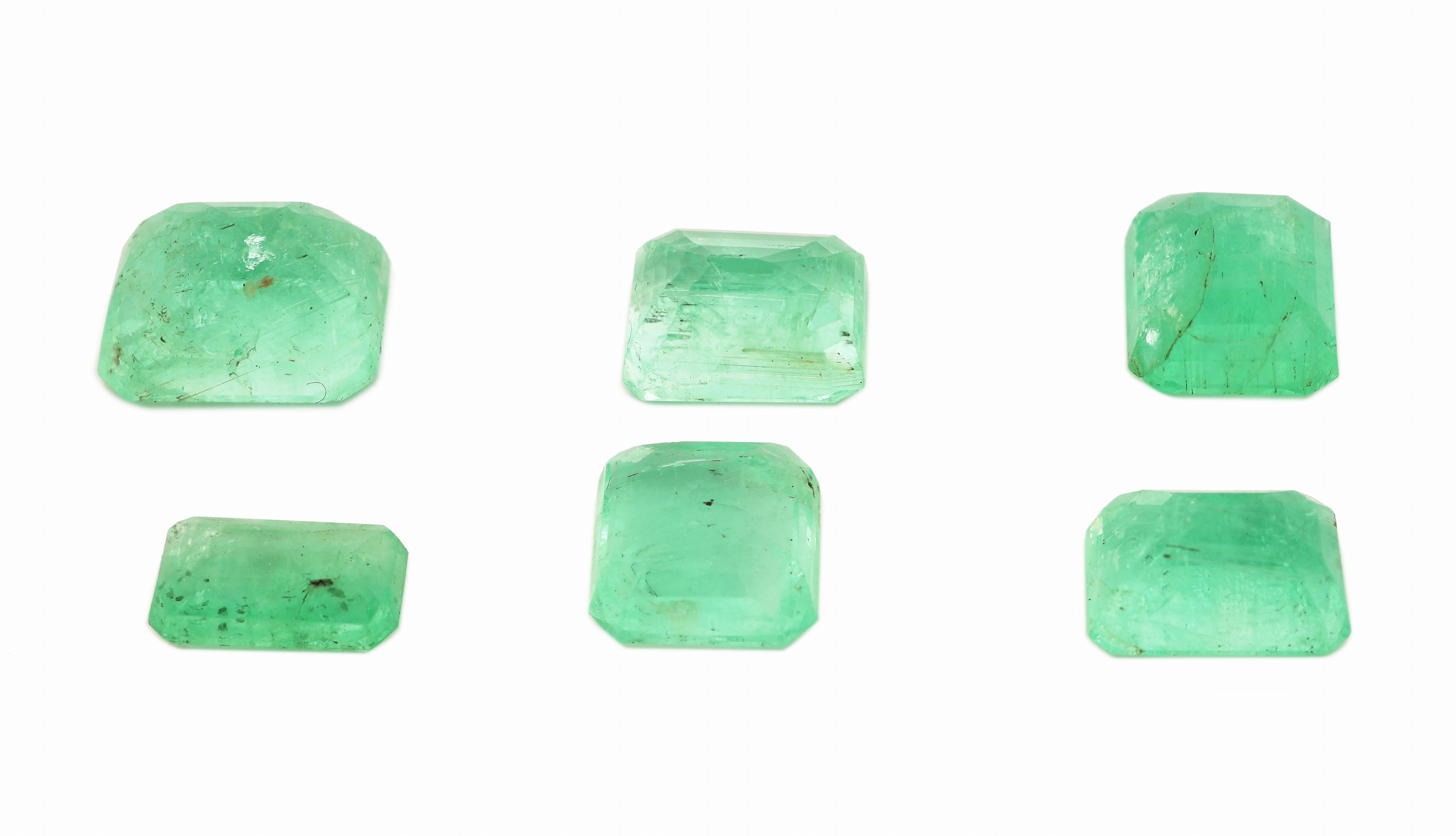 Detail a: Lot 6 lose Smaragde, zus. ca. 13.8 ct, Treppenschliff in versch. Größen